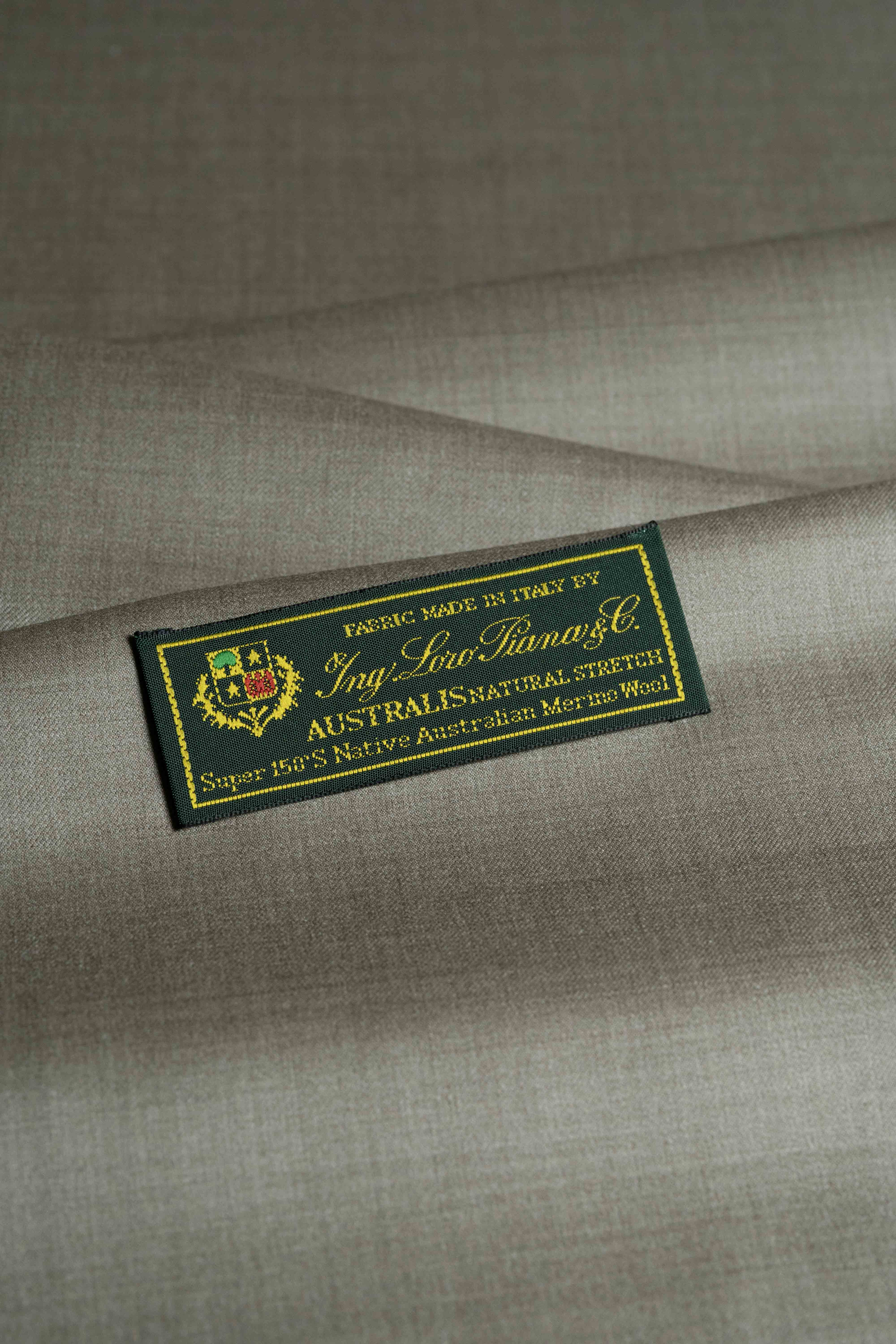 Loro Piana taupe Australian 150's merino wool suit fabric with brand label on smooth textile.