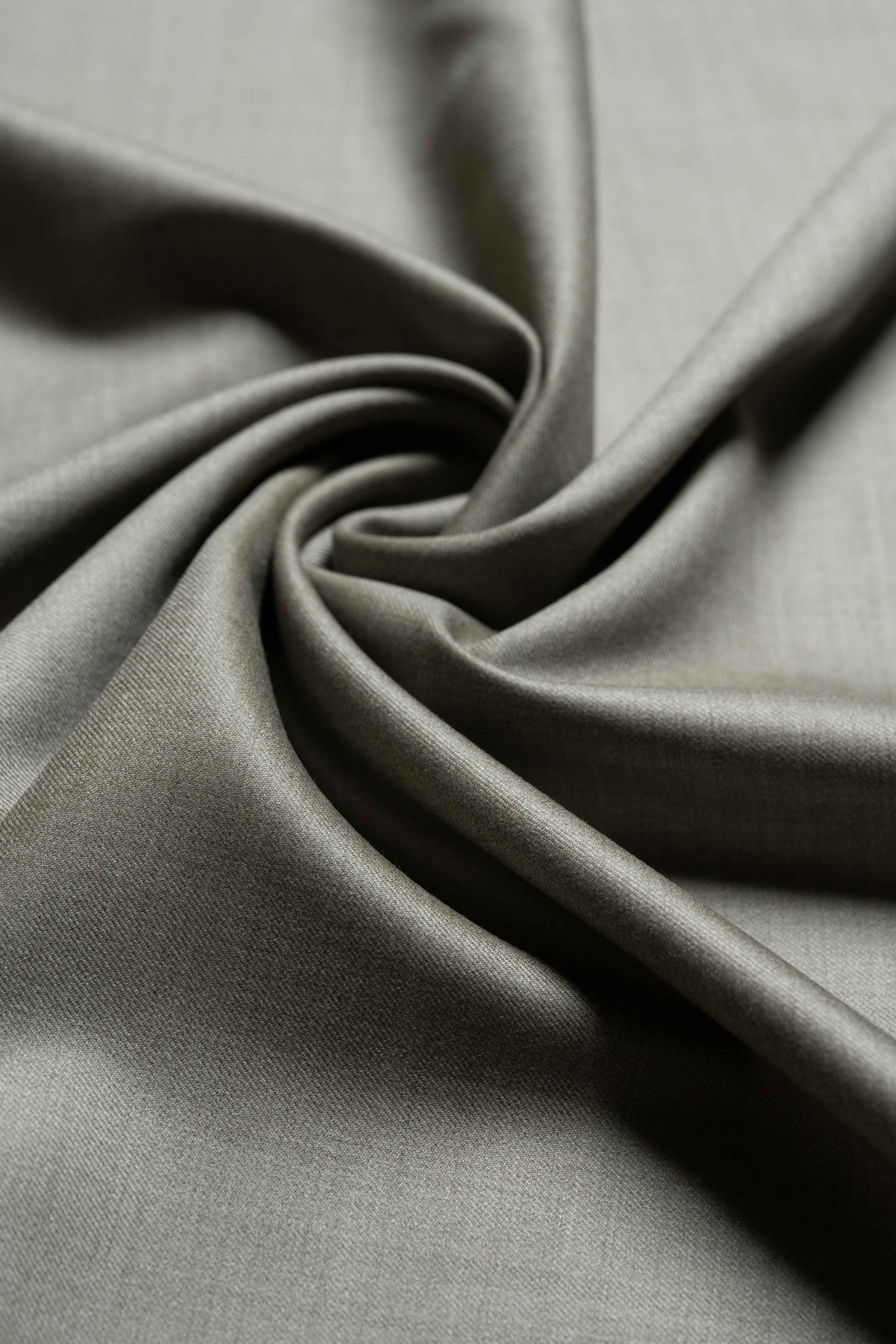 Loro Piana taupe Australian 150's merino wool suit fabric, luxurious and smooth texture for tailored outfits.
