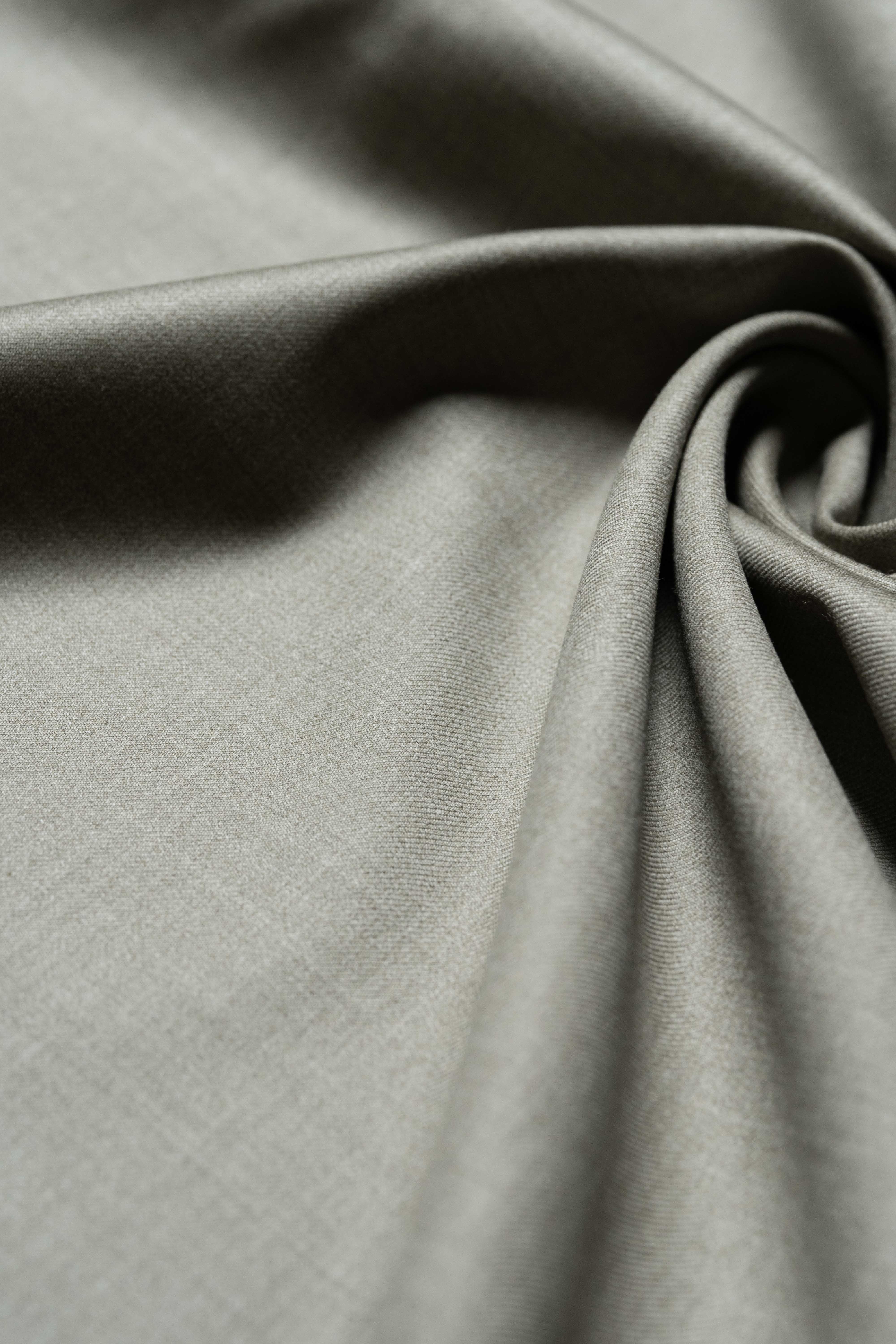 Loro Piana taupe Australian 150's merino wool suit fabric with smooth texture and elegant color.