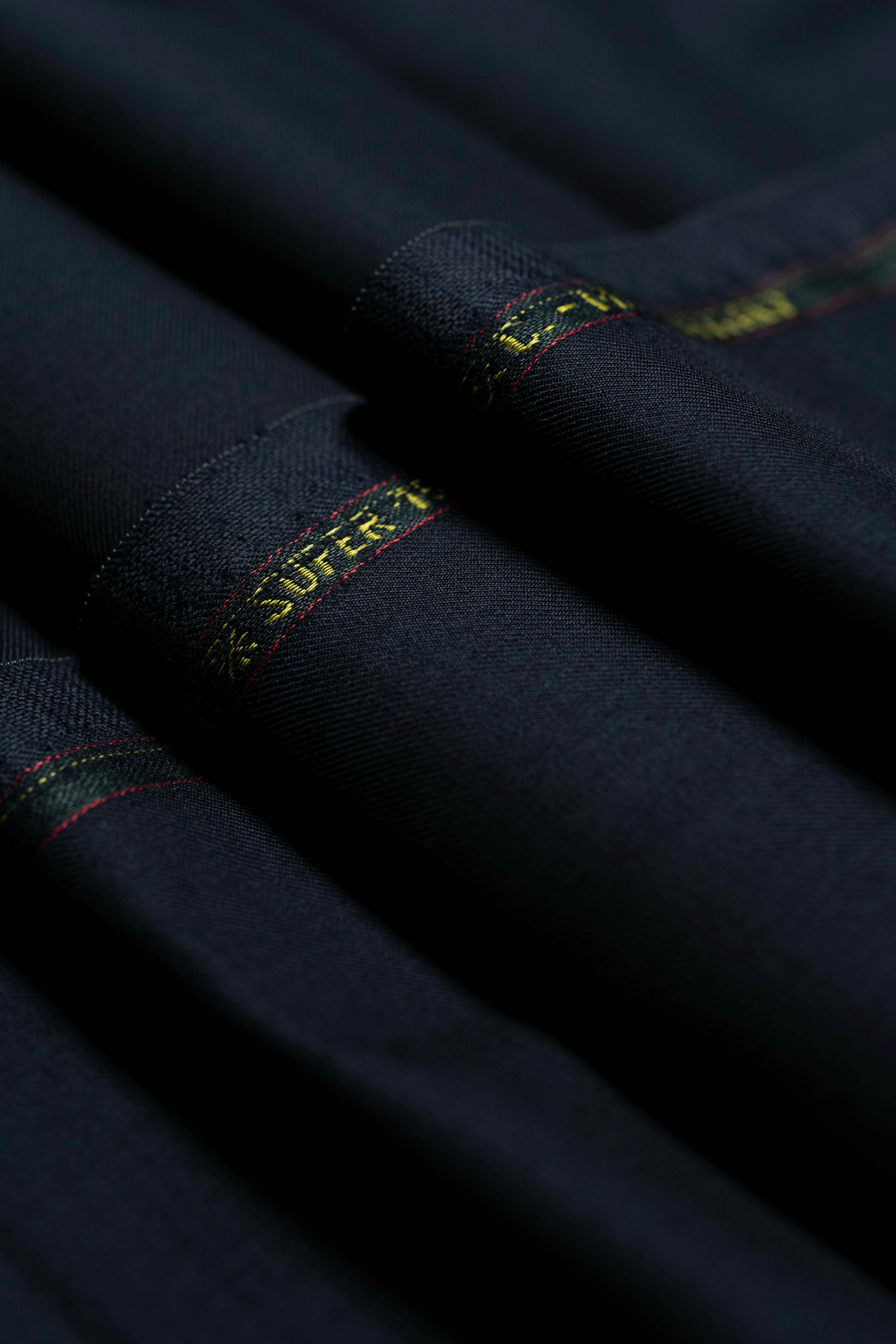 Loro Piana Dark Navy Tasmanian 150's Wool Suit Fabric close-up showing luxurious texture and quality.