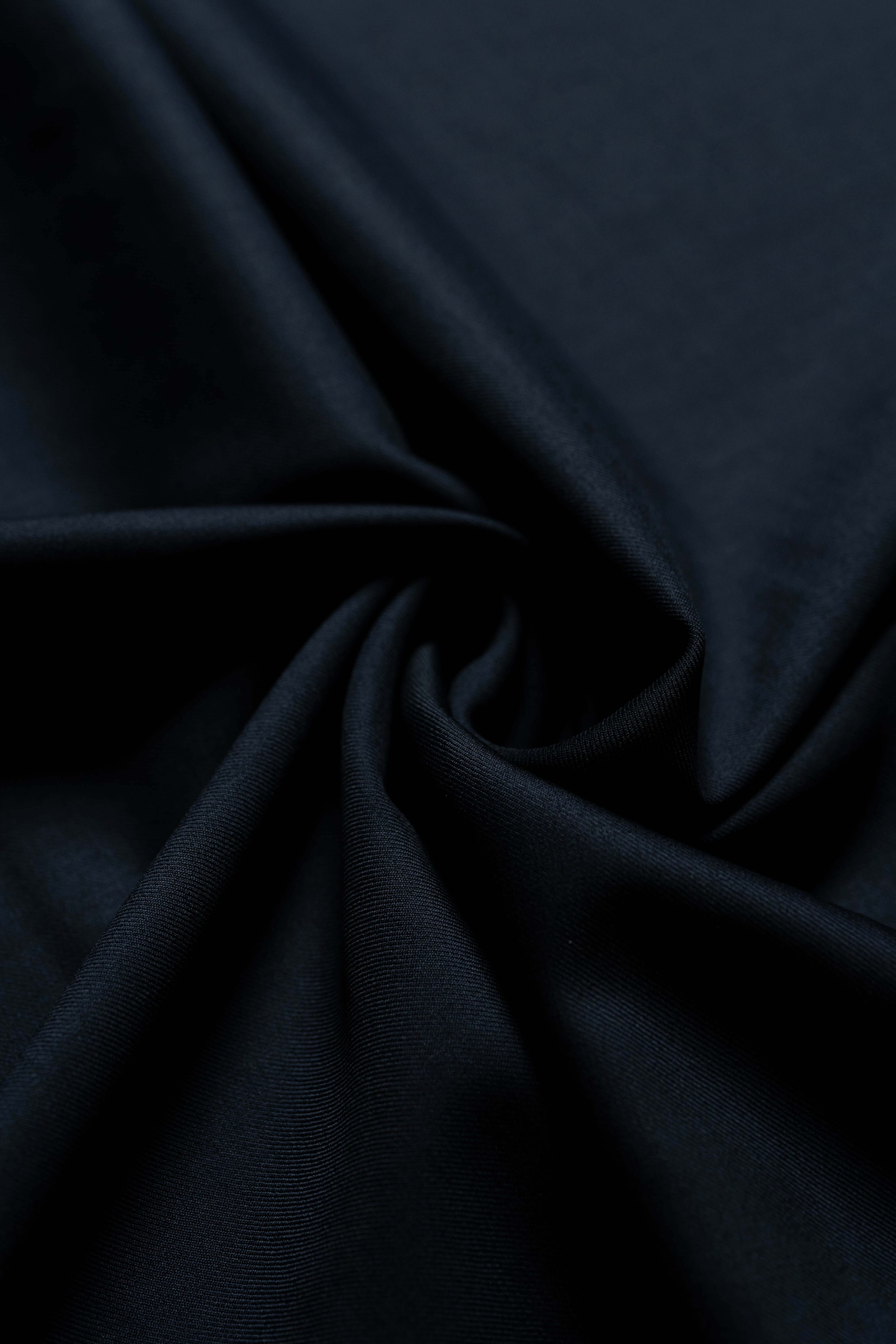Loro Piana Dark Navy Tasmanian 150's Wool suit fabric showcasing soft texture and luxurious quality.