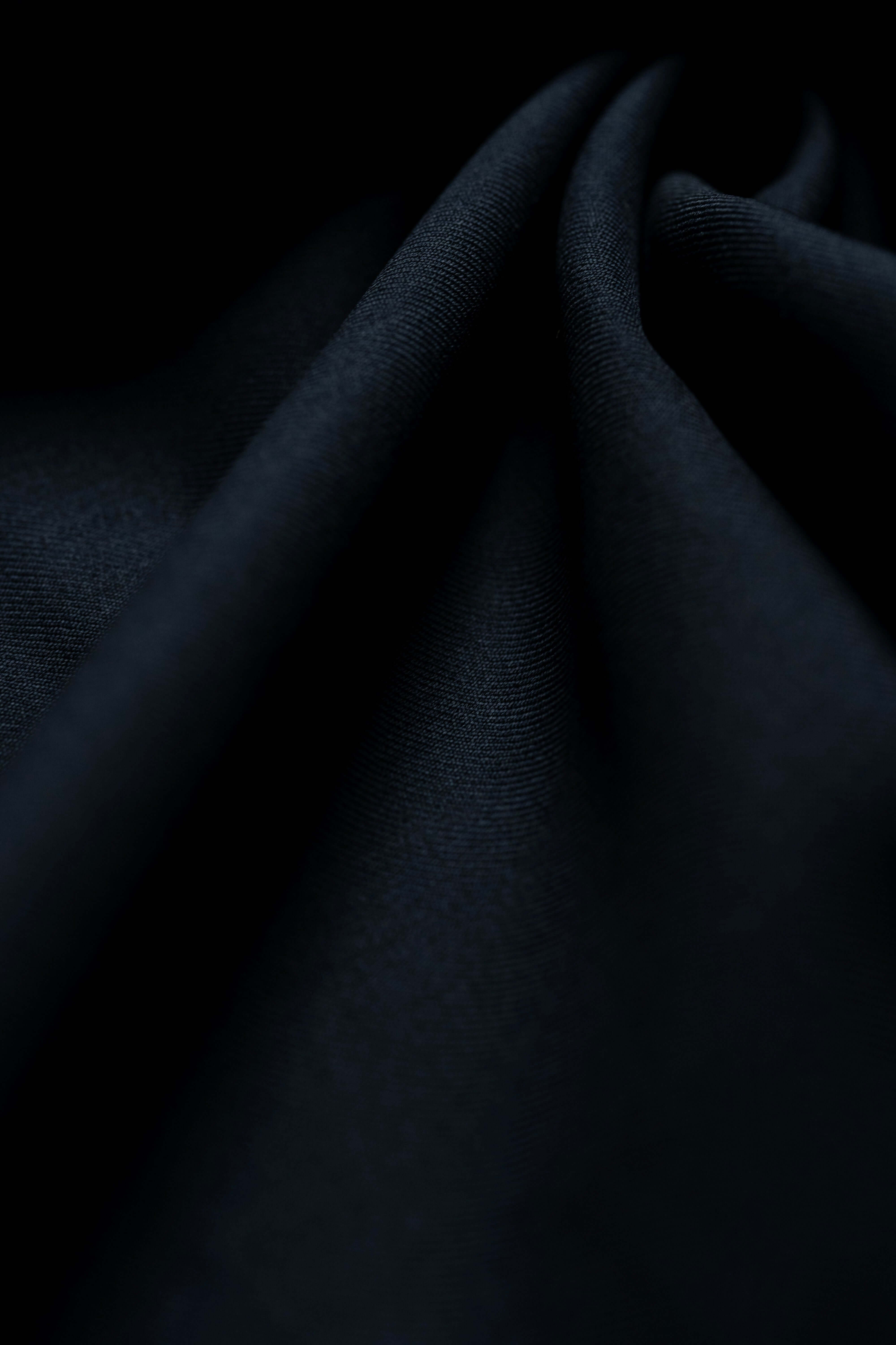 Loro Piana Dark Navy Tasmanian 150's Wool Suit Fabric showcasing luxurious texture in a close-up shot.