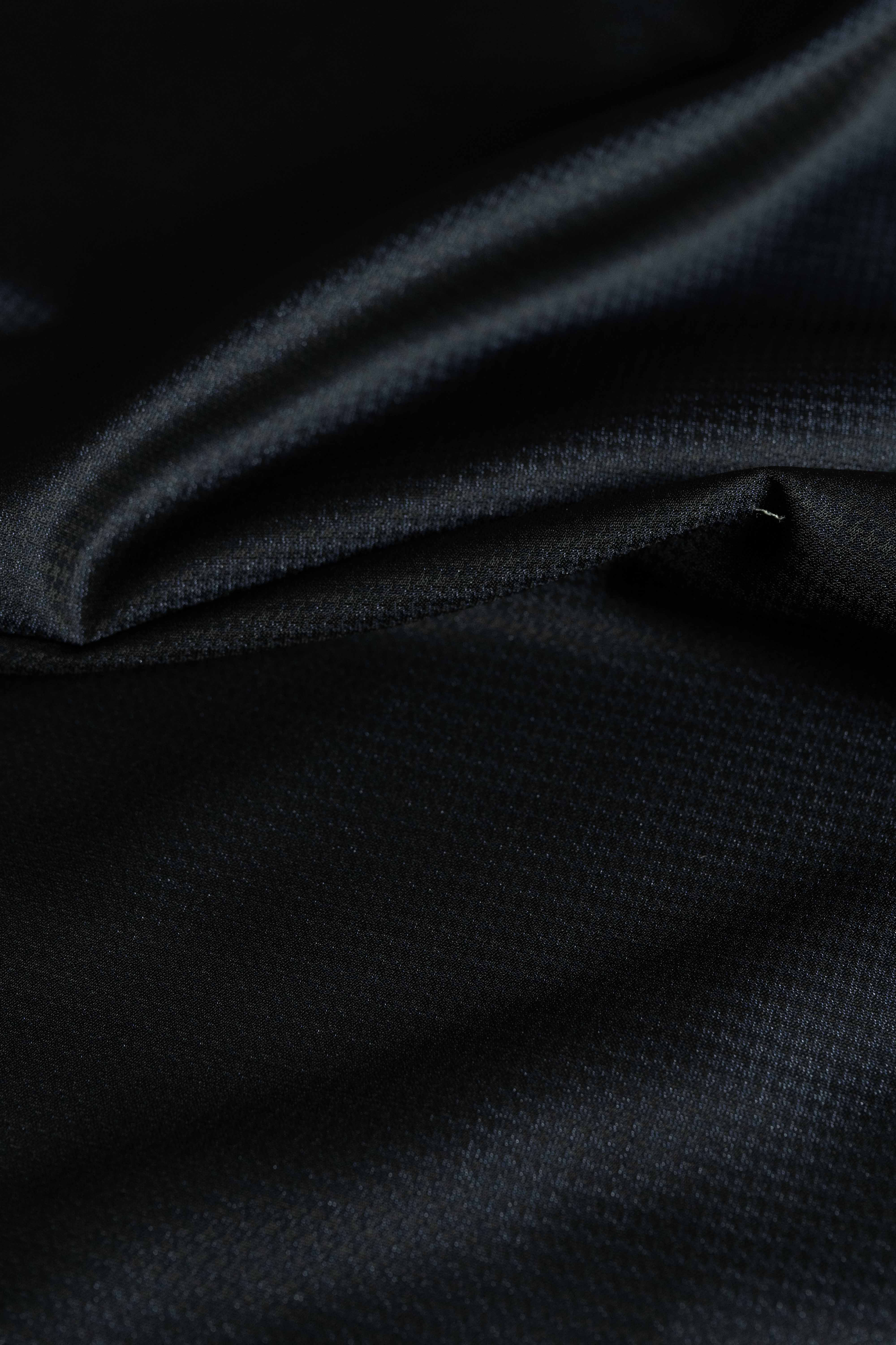 Scabal Dark Navy Festival Collection Wool & Polyester fabric close-up, showcasing its smooth texture.