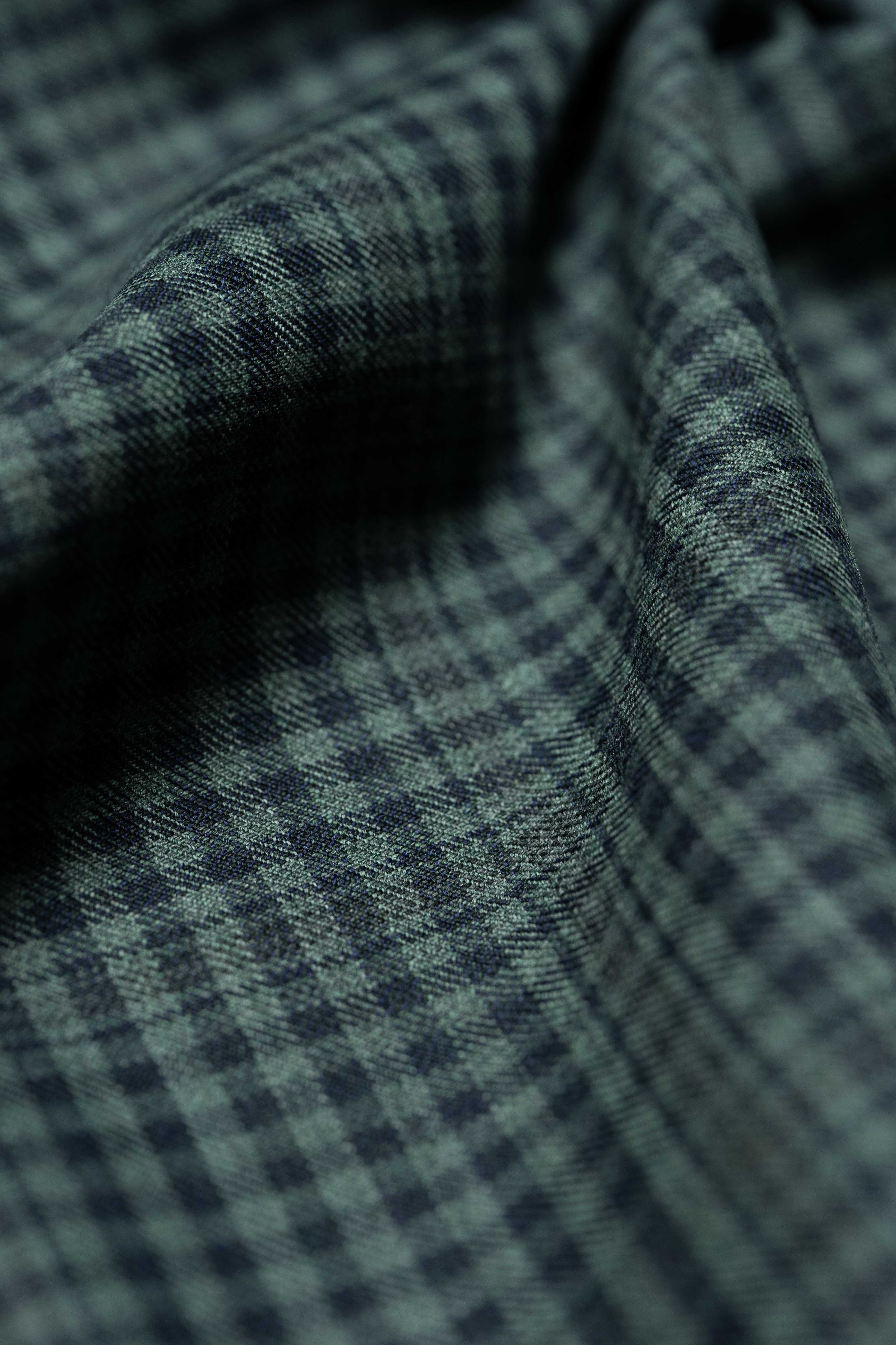 Loro Piana dark teal wool jacket fabric with a textured check pattern in soft weave.