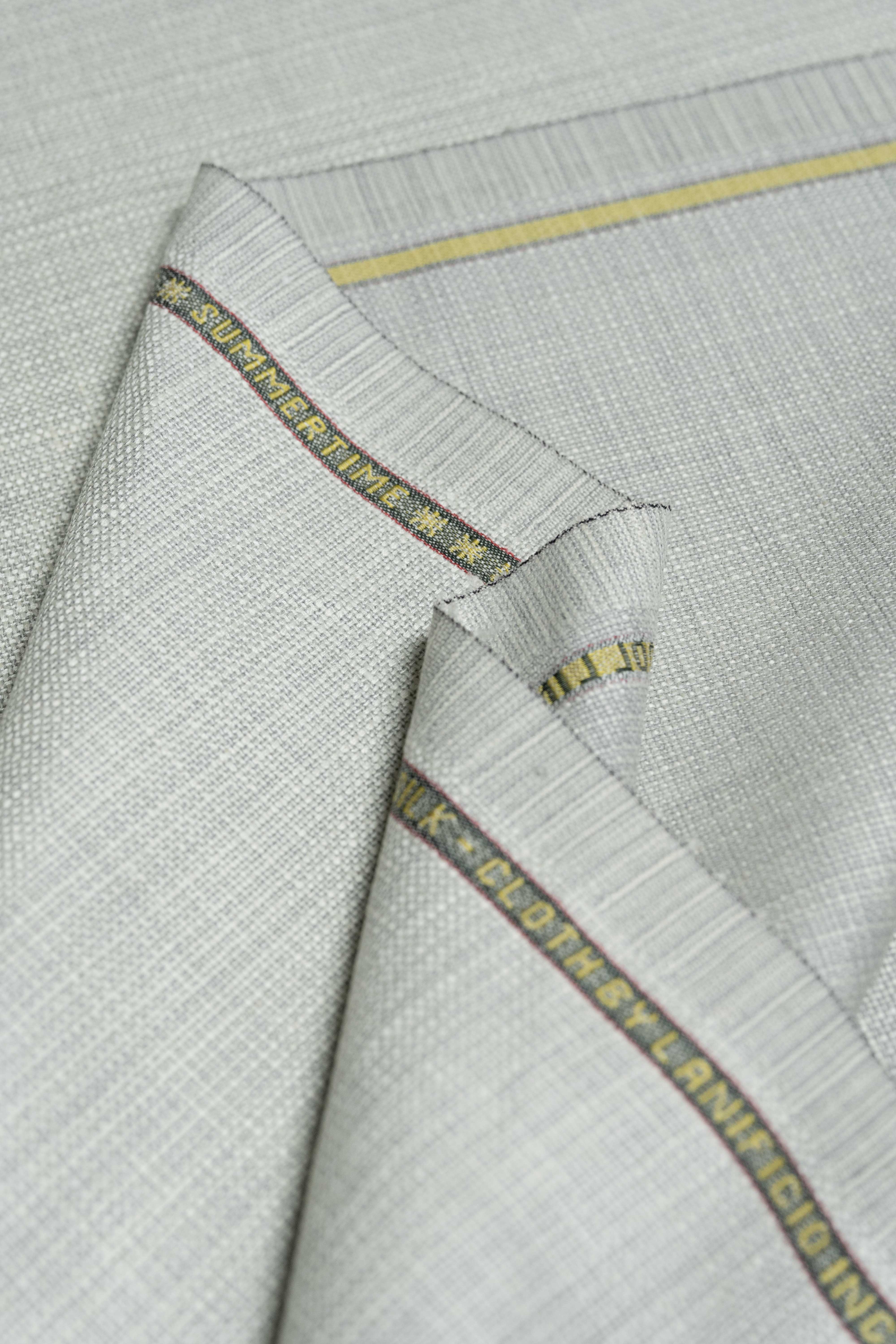 Loro Piana Beige Wool Silk Linen Jacket Fabric showcasing luxurious texture and intricate detailing.