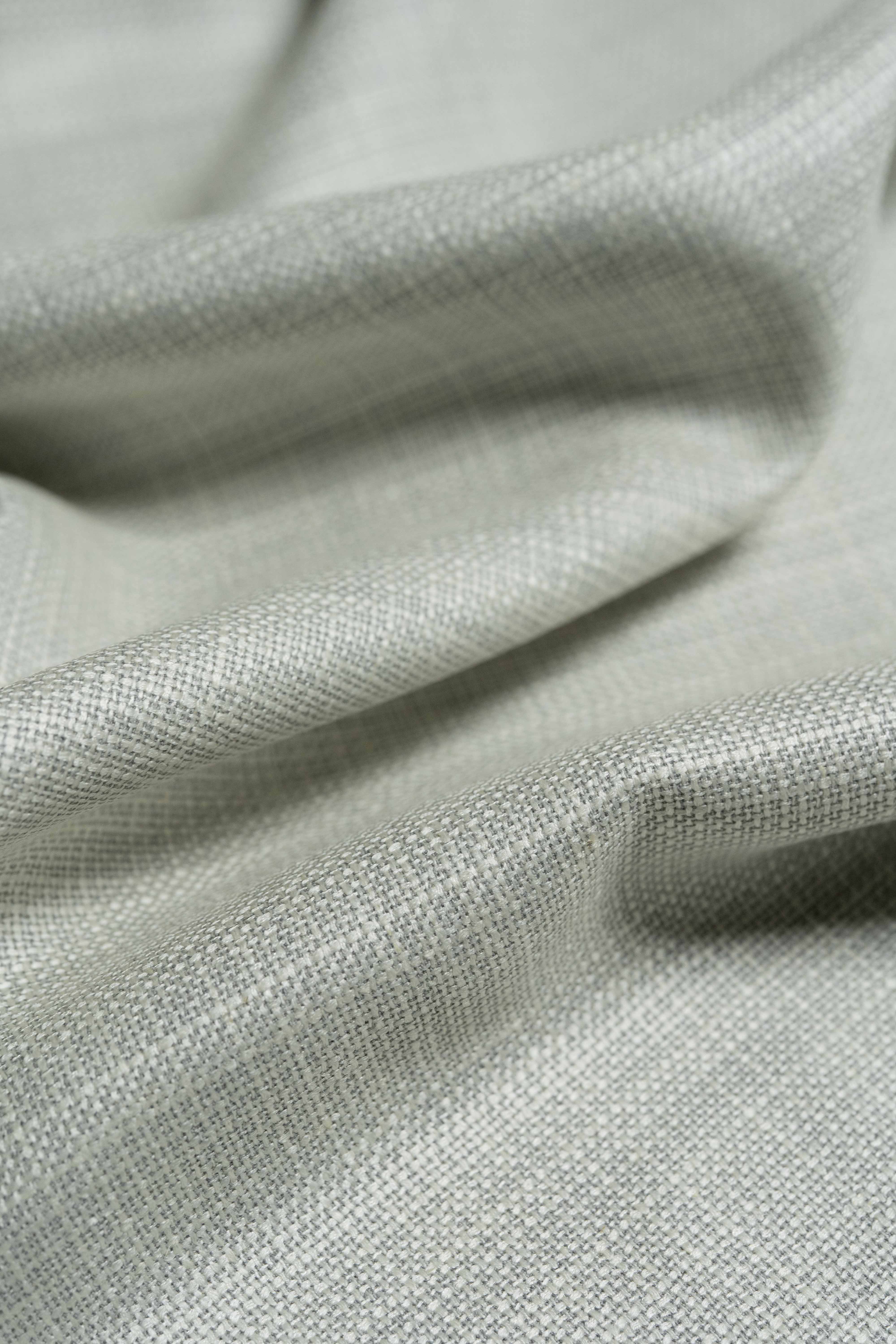 Loro Piana beige wool silk linen jacket fabric with a luxurious texture and elegant drape.