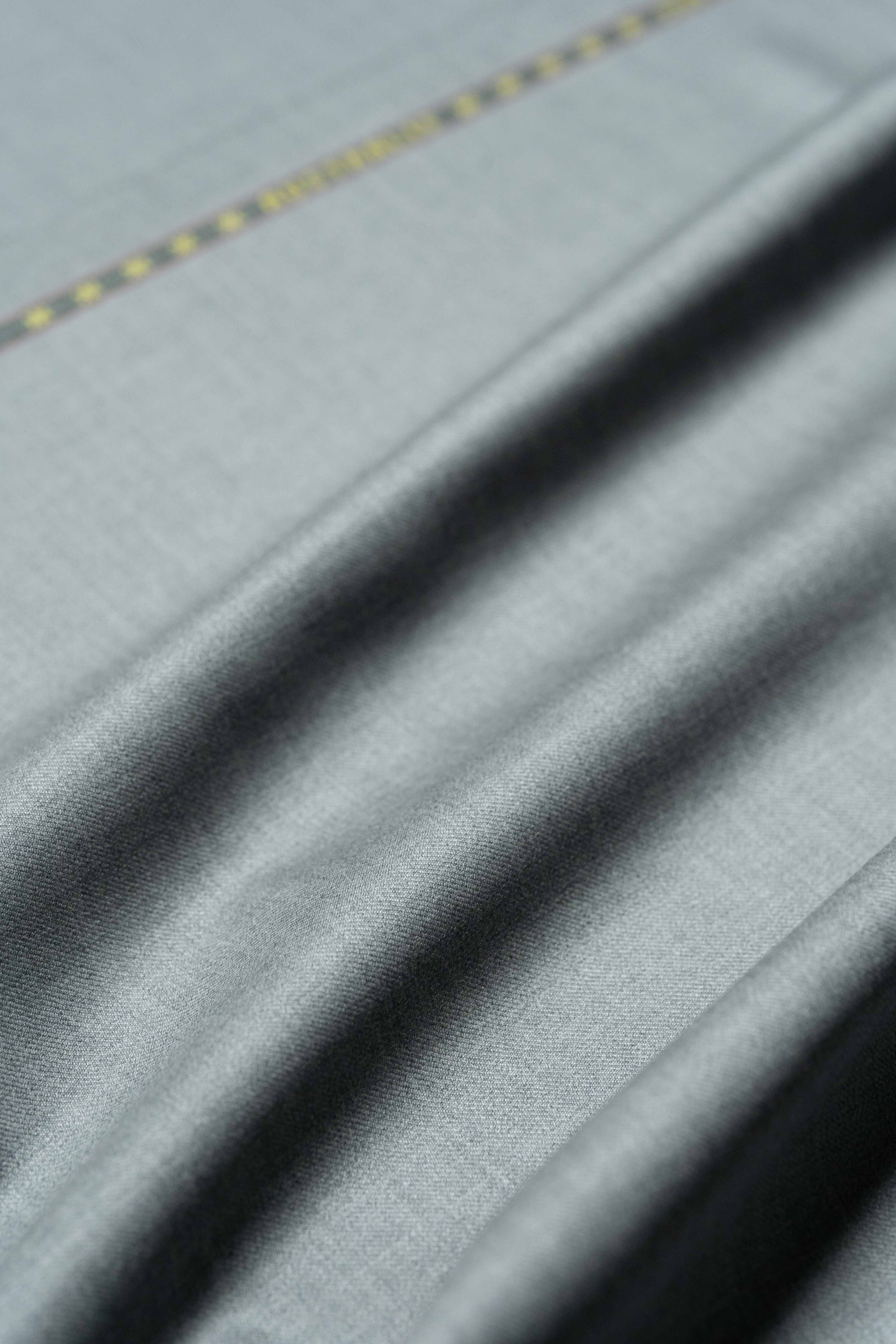 Loro Piana Grey Australis 150's Merino Wool Suit Fabric showcasing luxurious texture and fine craftsmanship.