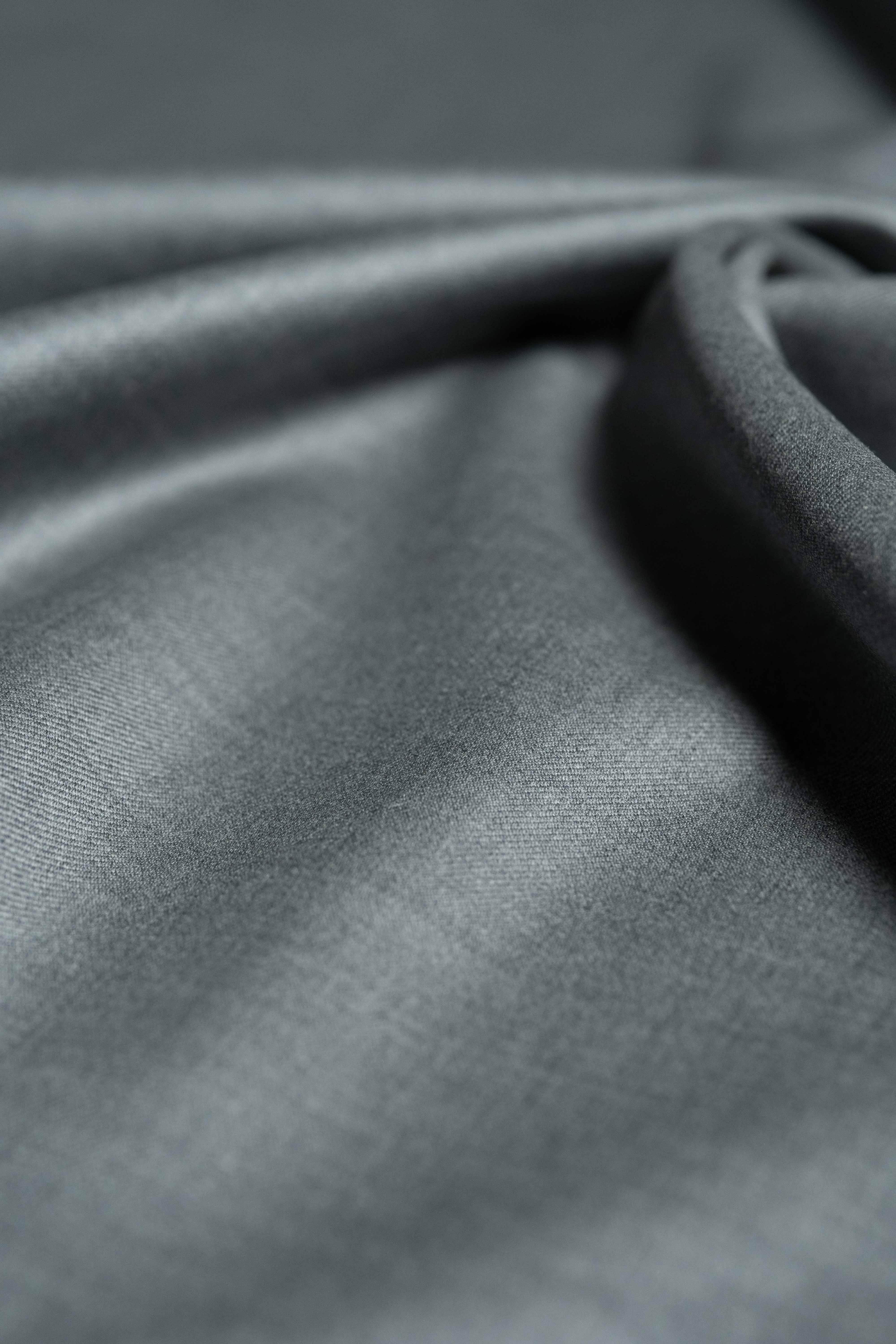 Loro Piana Grey Australis 150's Merino Wool Suit Fabric showcasing its luxurious texture and fine craftsmanship.