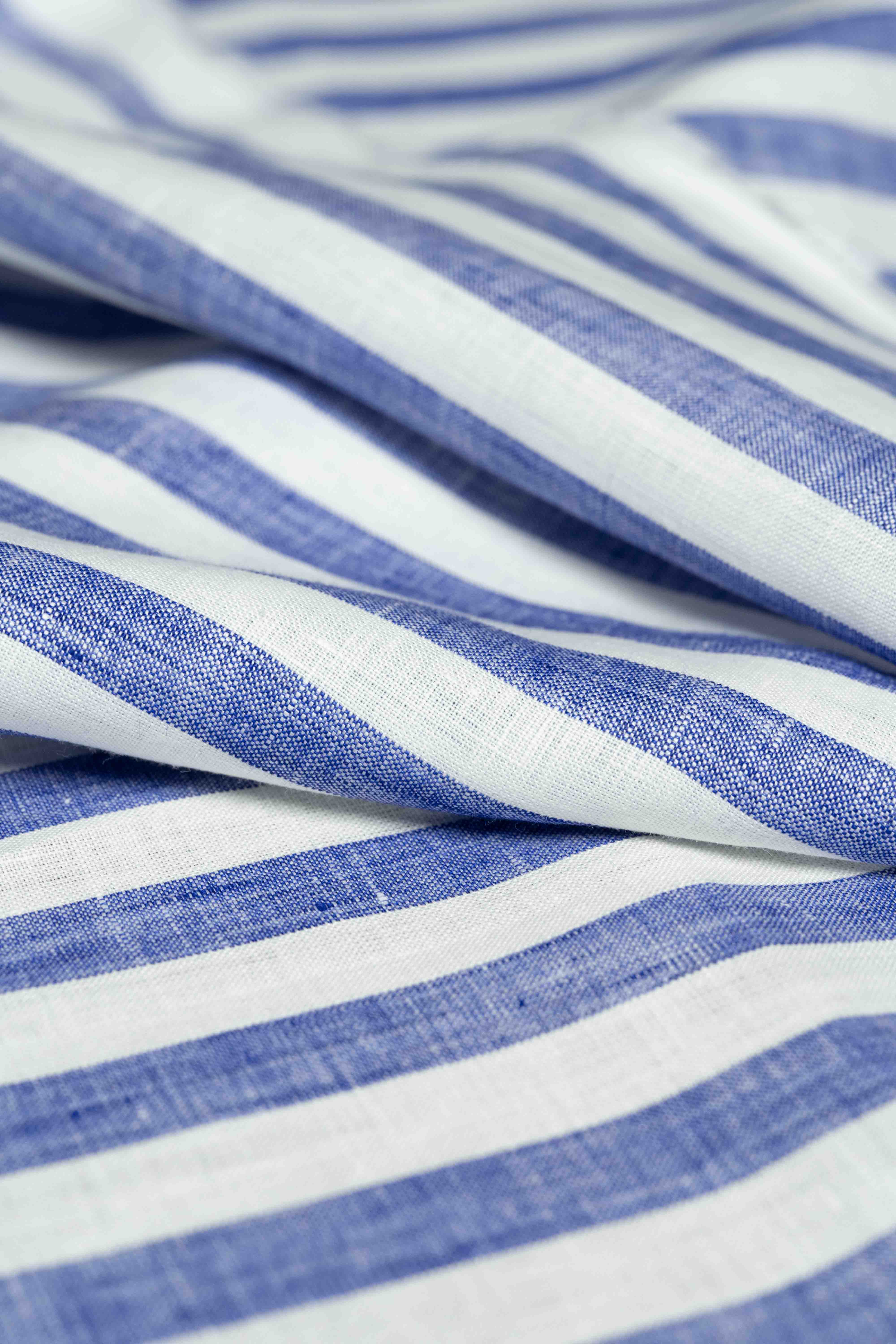 Solbiati linen navy stripe shirt fabric close-up, showcasing premium Italian craftsmanship in blue and white stripes.