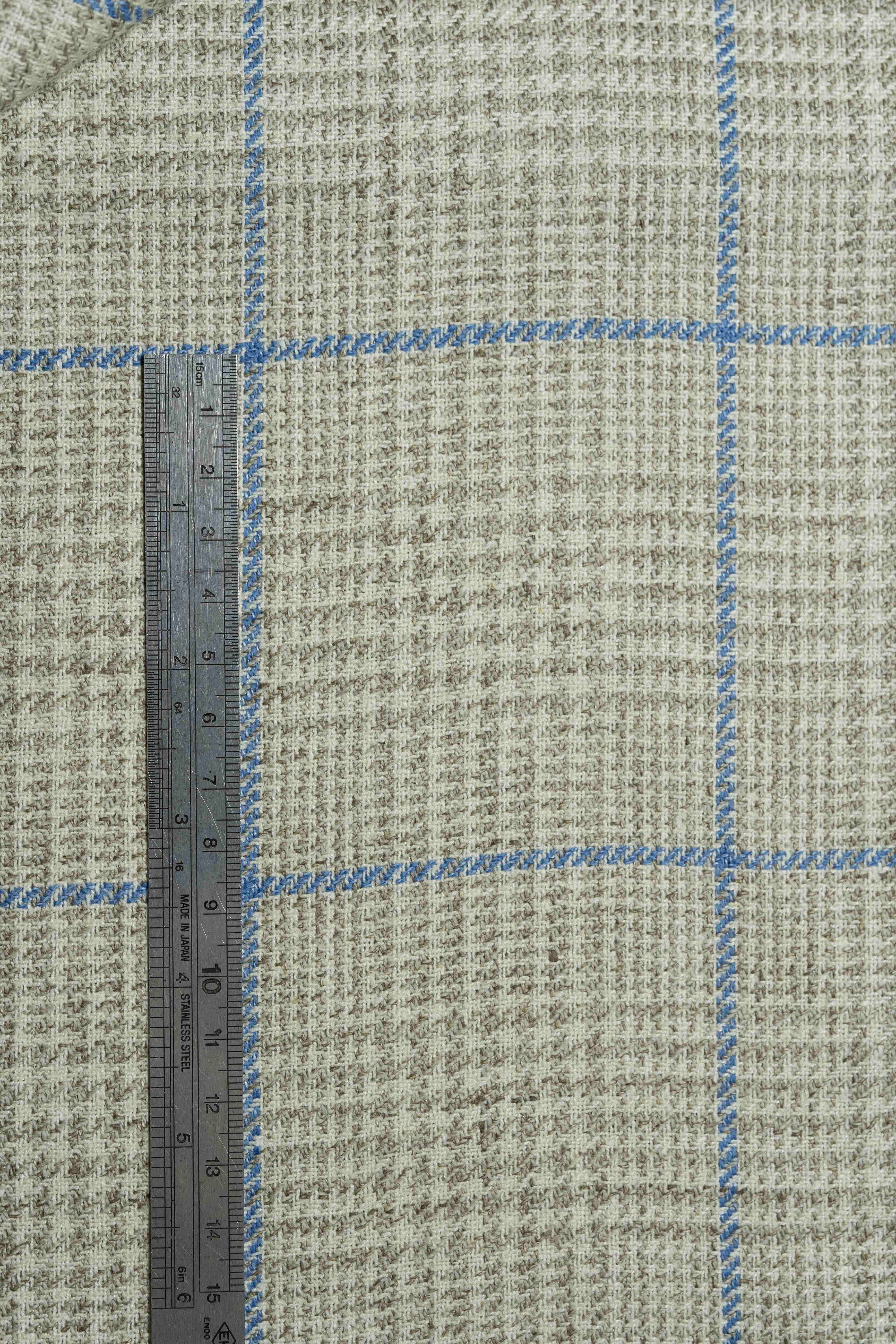 Marling & Evans blue check linen cotton suit jacketing fabric with measuring ruler for scale.