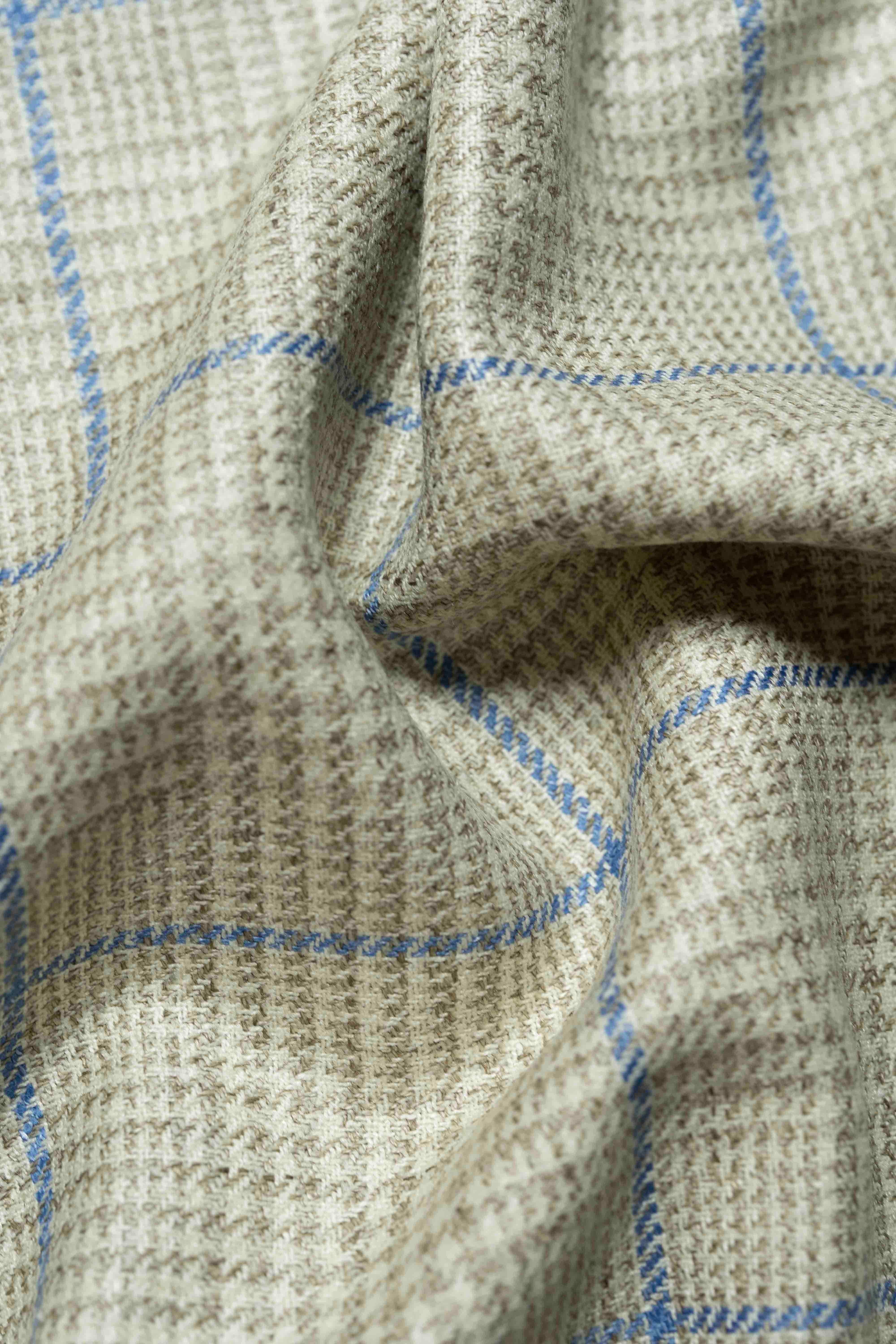 Marling & Evans blue check linen cotton suit jacketing texture with soft drape and intricate pattern.