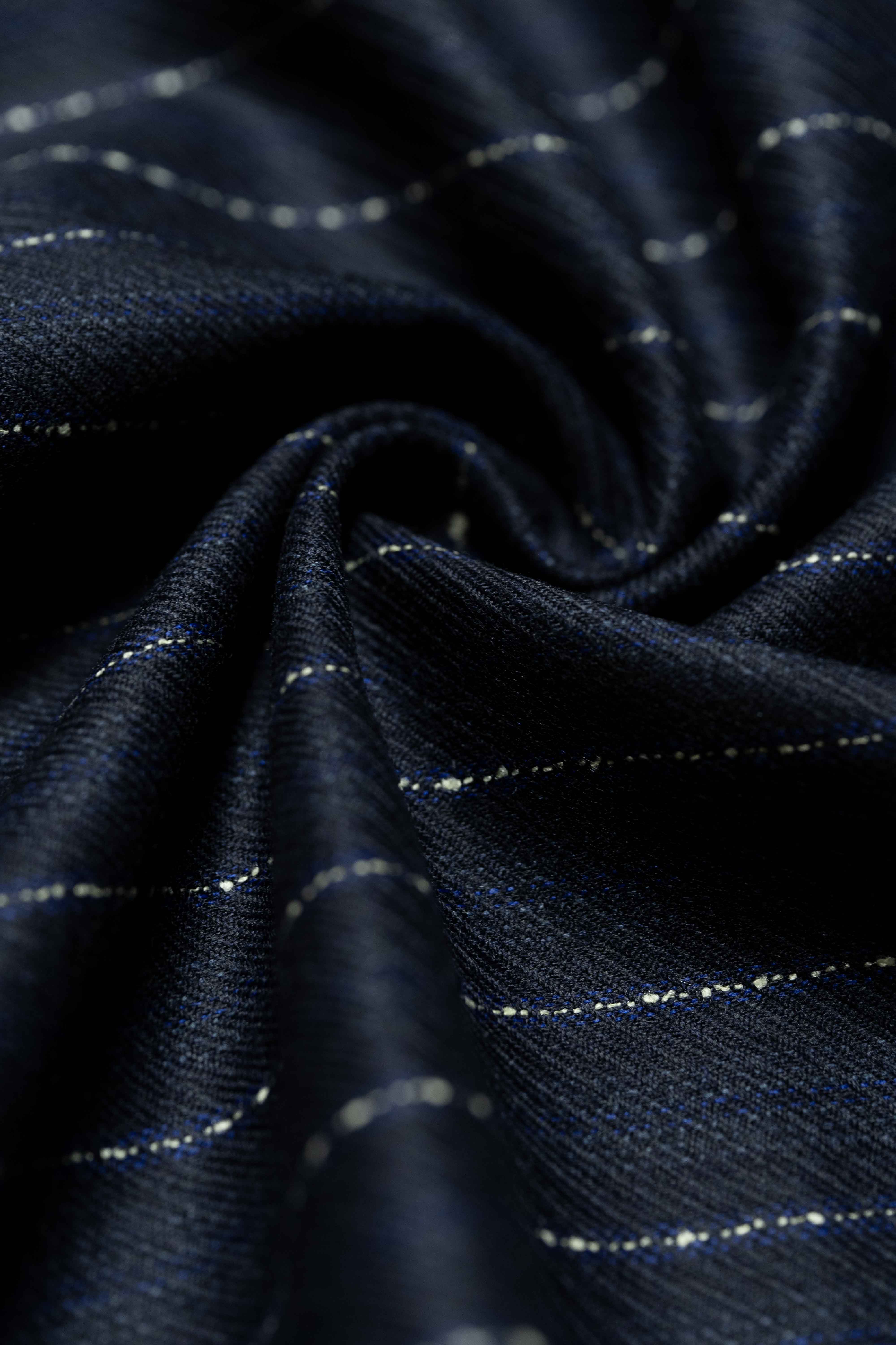 Dormeuil Blue & White Stripe Wool Suiting fabric close-up, showcasing the luxurious texture and design.