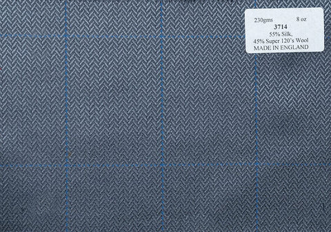 3714 Grey Herringbone with Blue Overcheck (Price per0.25m)