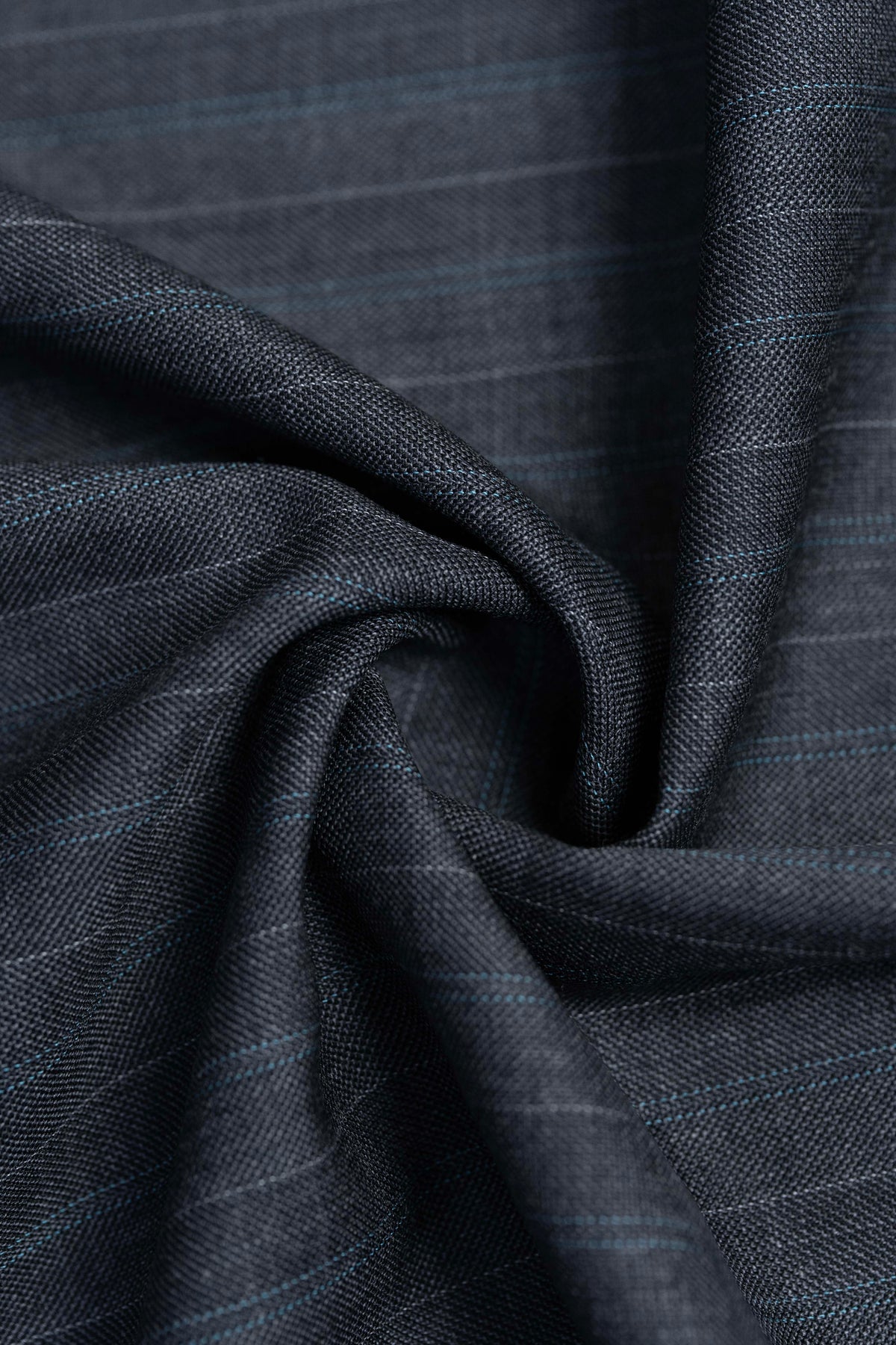 Barrington Panama Weave fabric showcasing a charcoal wool suit with blue stripe detail.