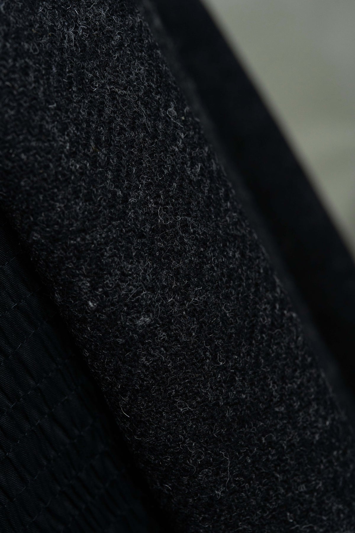Dark Charcoal Heavy Woolen Fabric showcasing British Red Stripe Wool Suit Fabric patterns and texture.