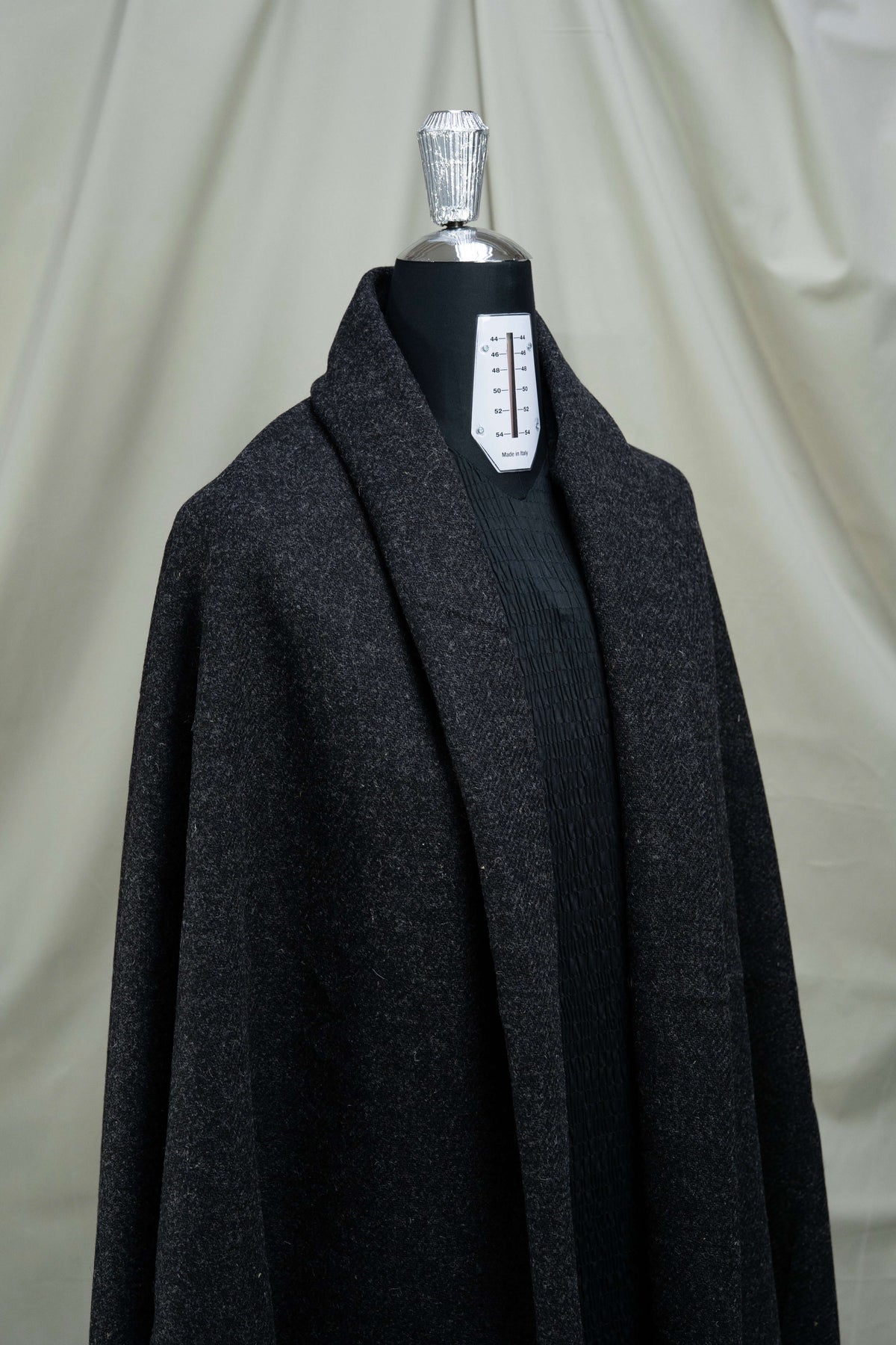 Dark Charcoal Heavy Woolen Fabric draped on a mannequin, showcasing British Red Stripe Wool Suit Fabric.