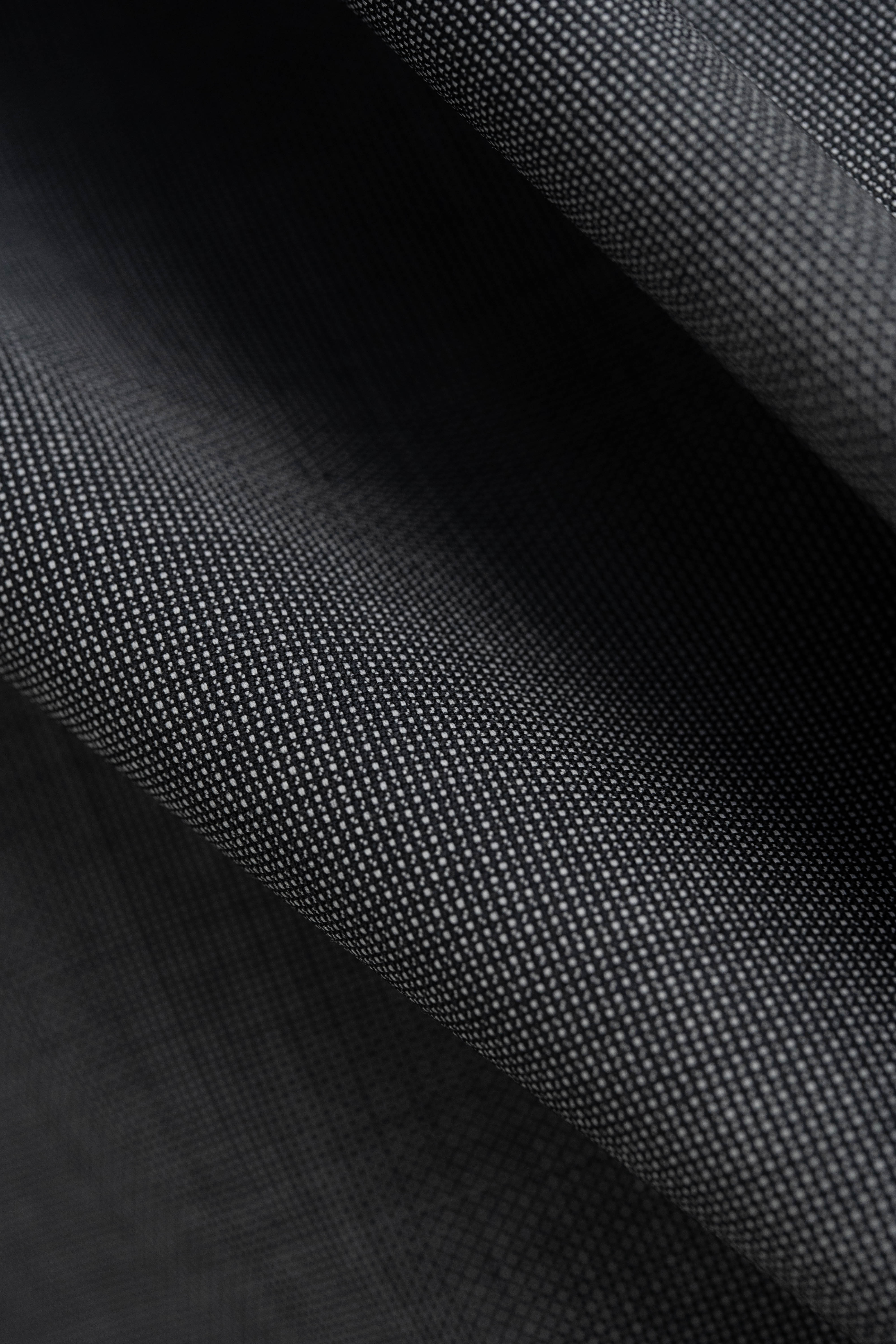 VBC Lightweight Super 120's Wool Suit Fabric in a close-up view showing the dark, textured weave.