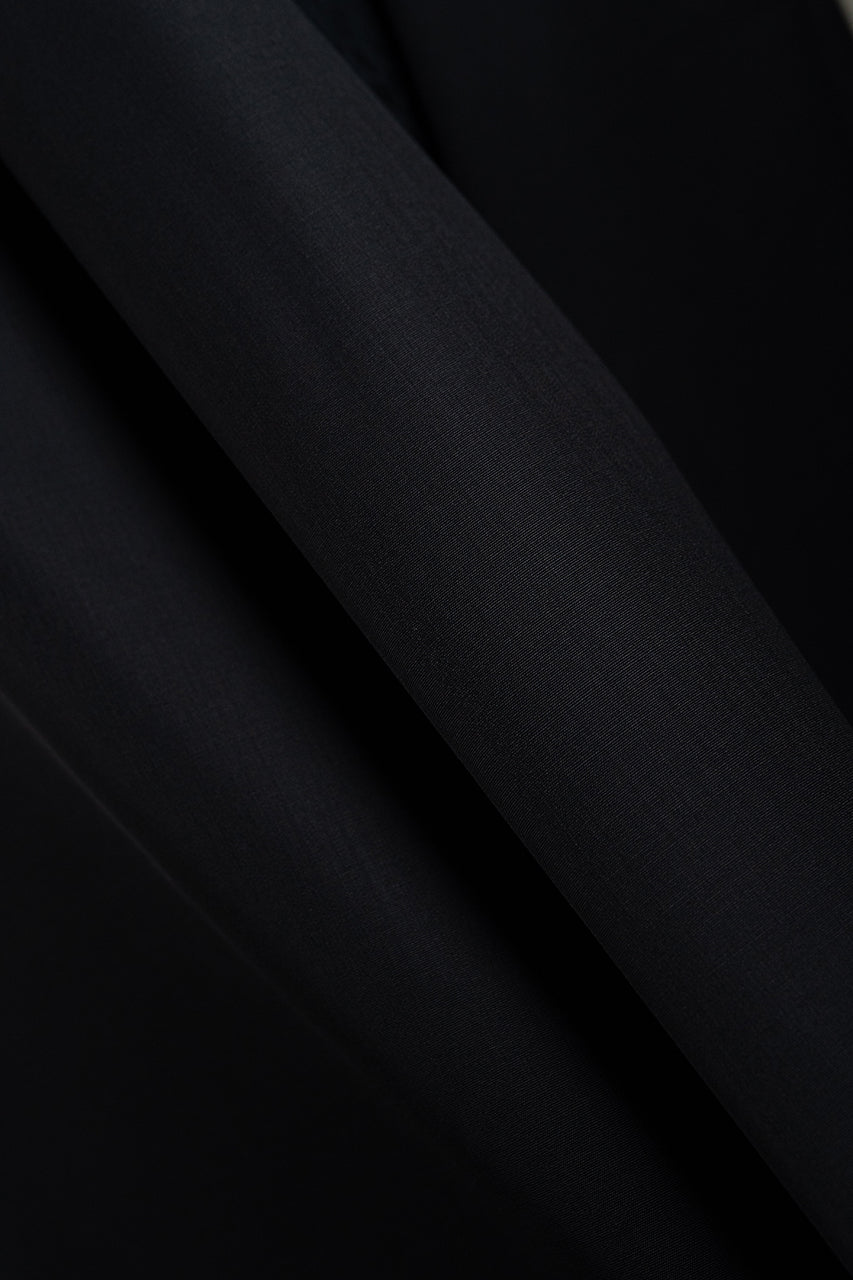 CERRUTI 1881 Black Plain Nobility Super 150's Wool Suiting-3 Meters fabric close-up.