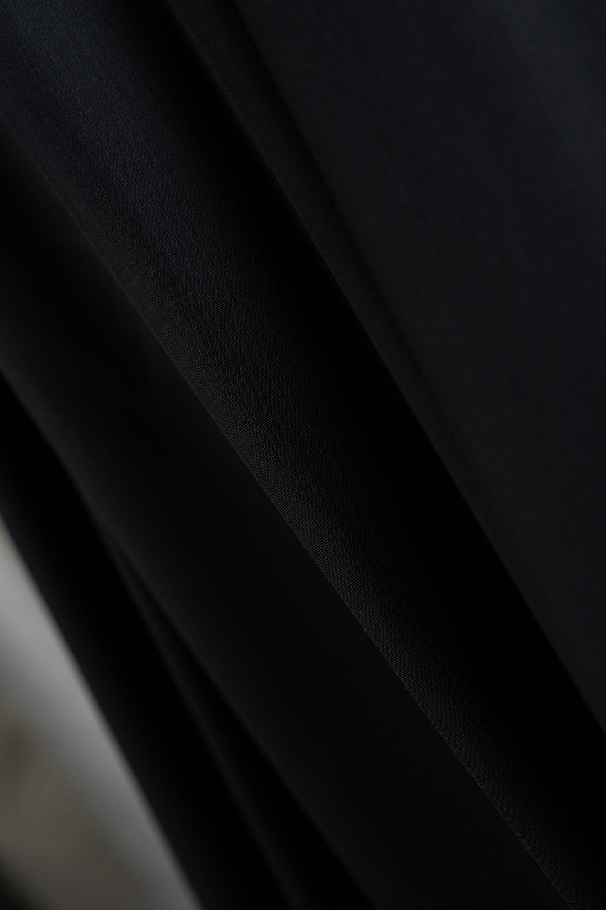CERRUTI 1881 Black Plain Nobility Super 150's Wool Suiting-3 Meters fabric close-up showing texture and color.