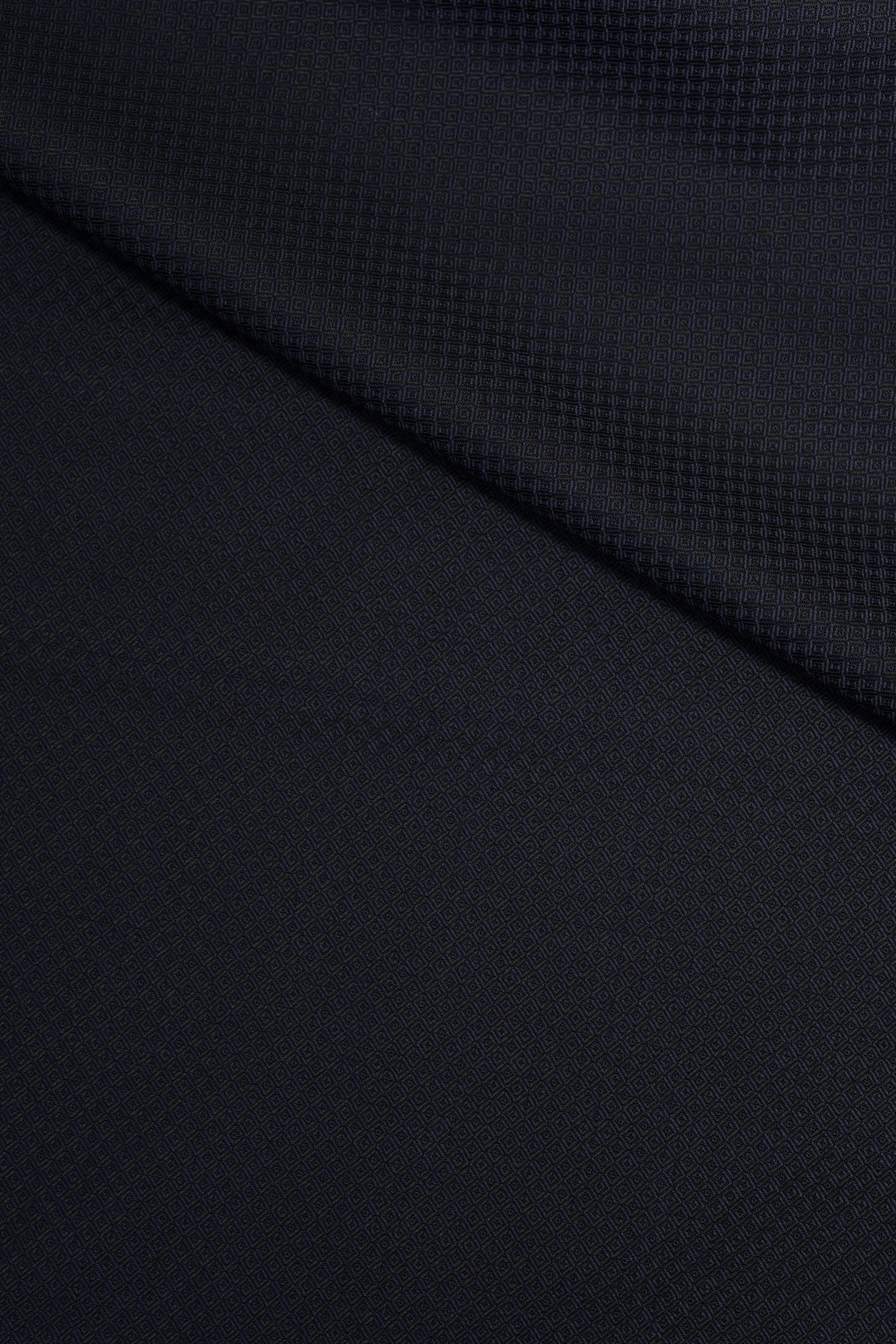 Barrington Panama Weave Dark Navy Geometric Pattern Wool Suiting fabric close-up, showcasing texture and design.