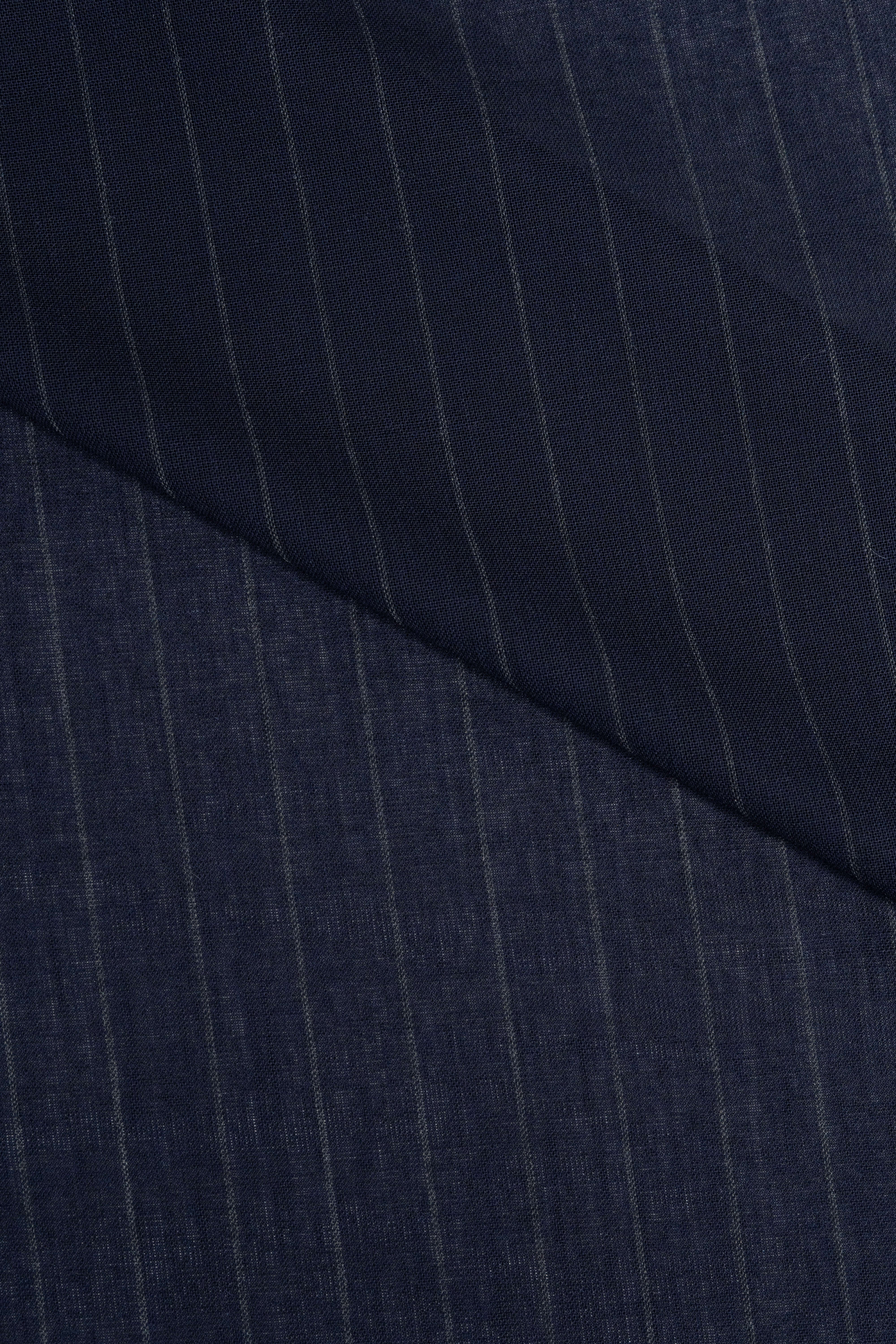 Close-up of Groves & Lindley dark blue stripe wool mohair suiting fabric showcasing fine stripes.