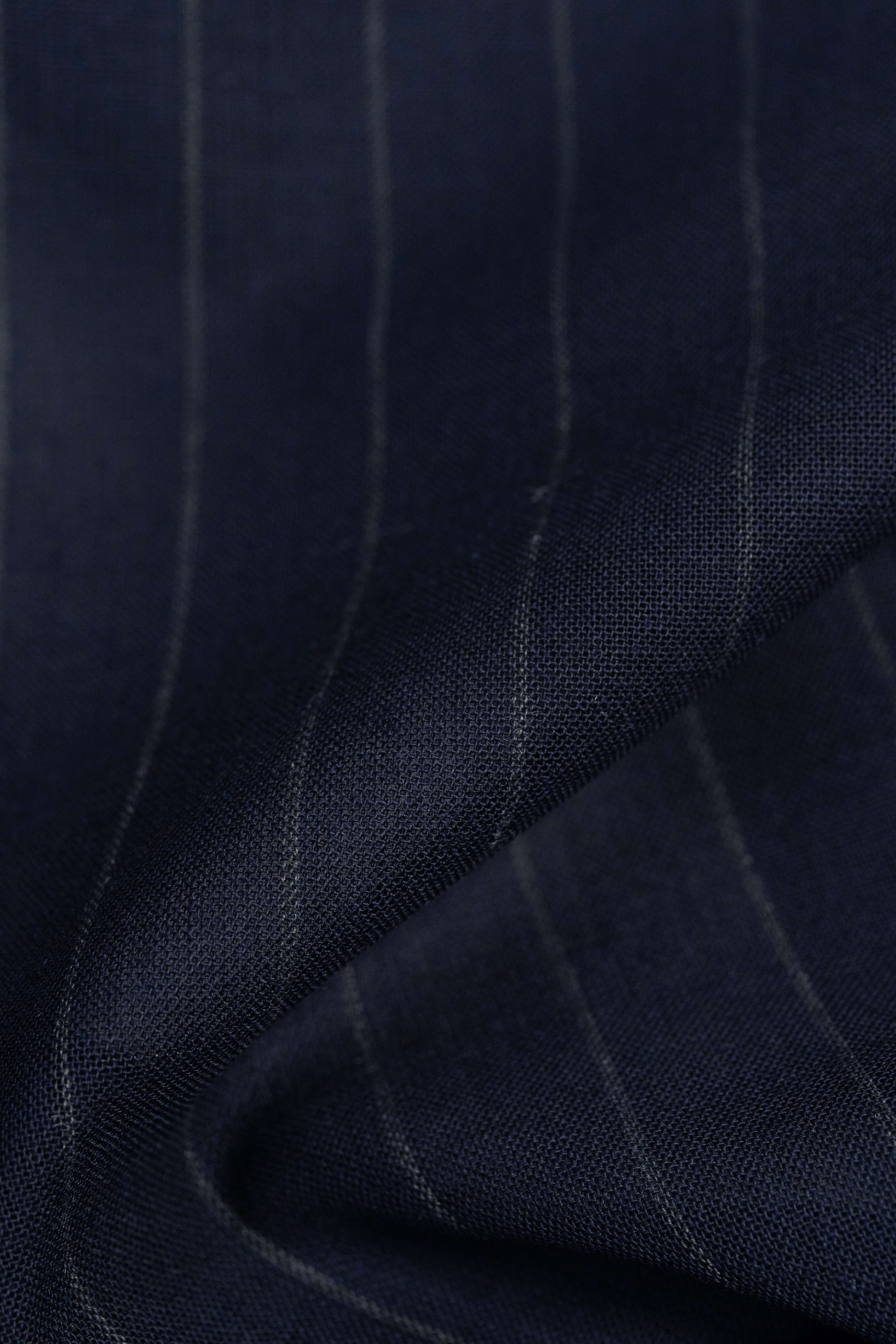 Close-up of Groves & Lindley dark blue stripe wool mohair suiting fabric, showcasing its texture and stripes.