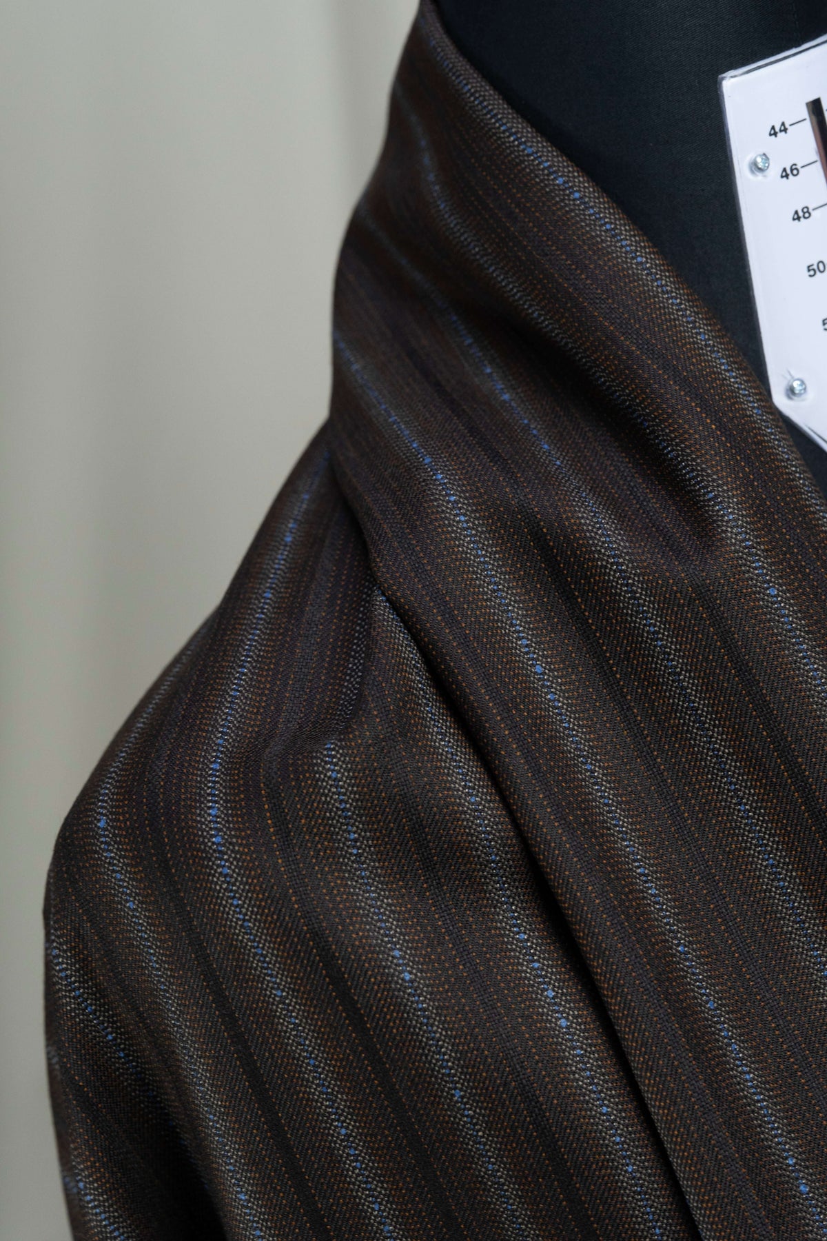 England Brown Fancy Stripe Wool Suiting, showcasing brown stripe wool suiting fabric in a detailed close-up.