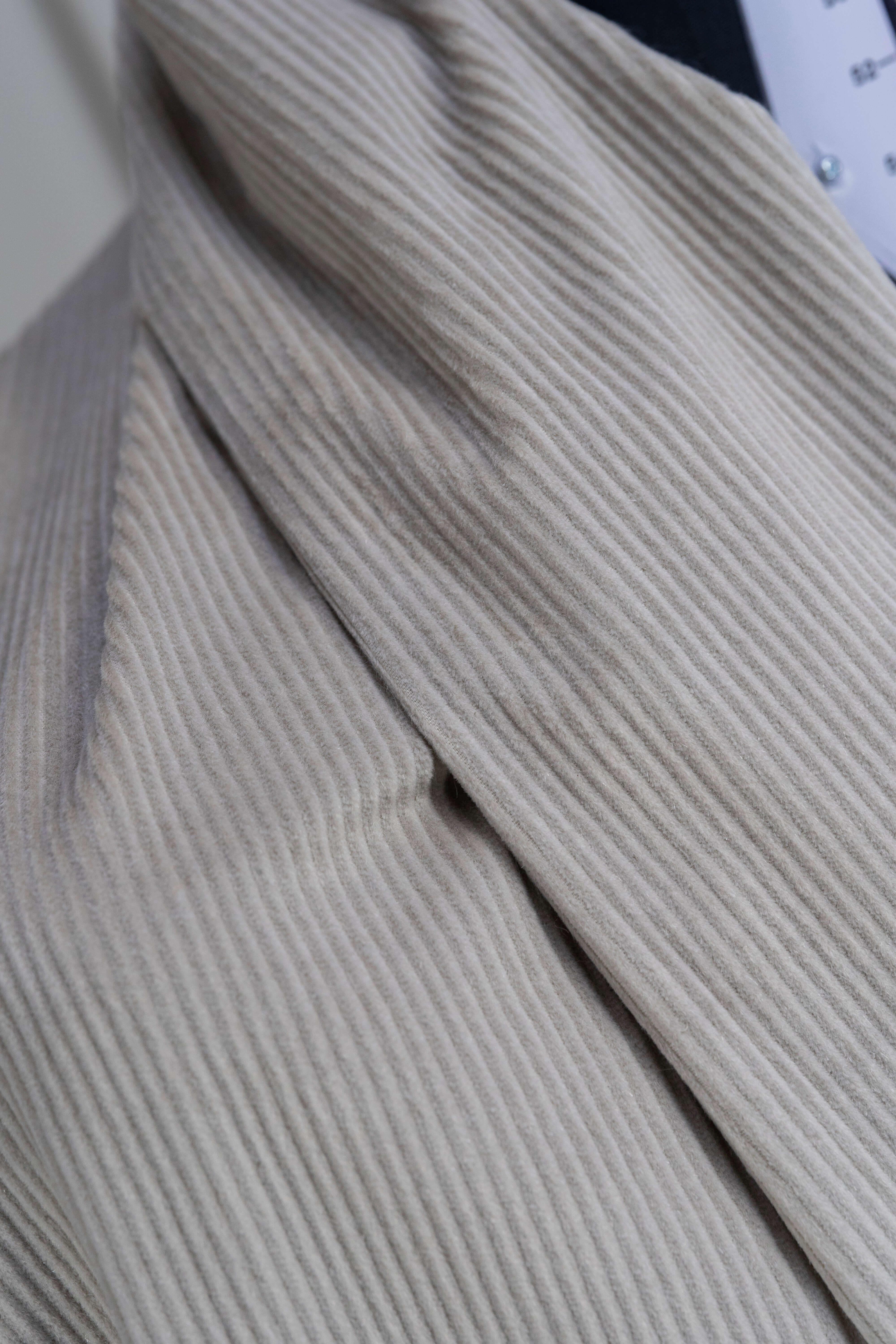 Close-up of PONTOGLIO 1883 cotton cashmere corduroy suiting fabric showcasing its soft texture and fine ribbing.