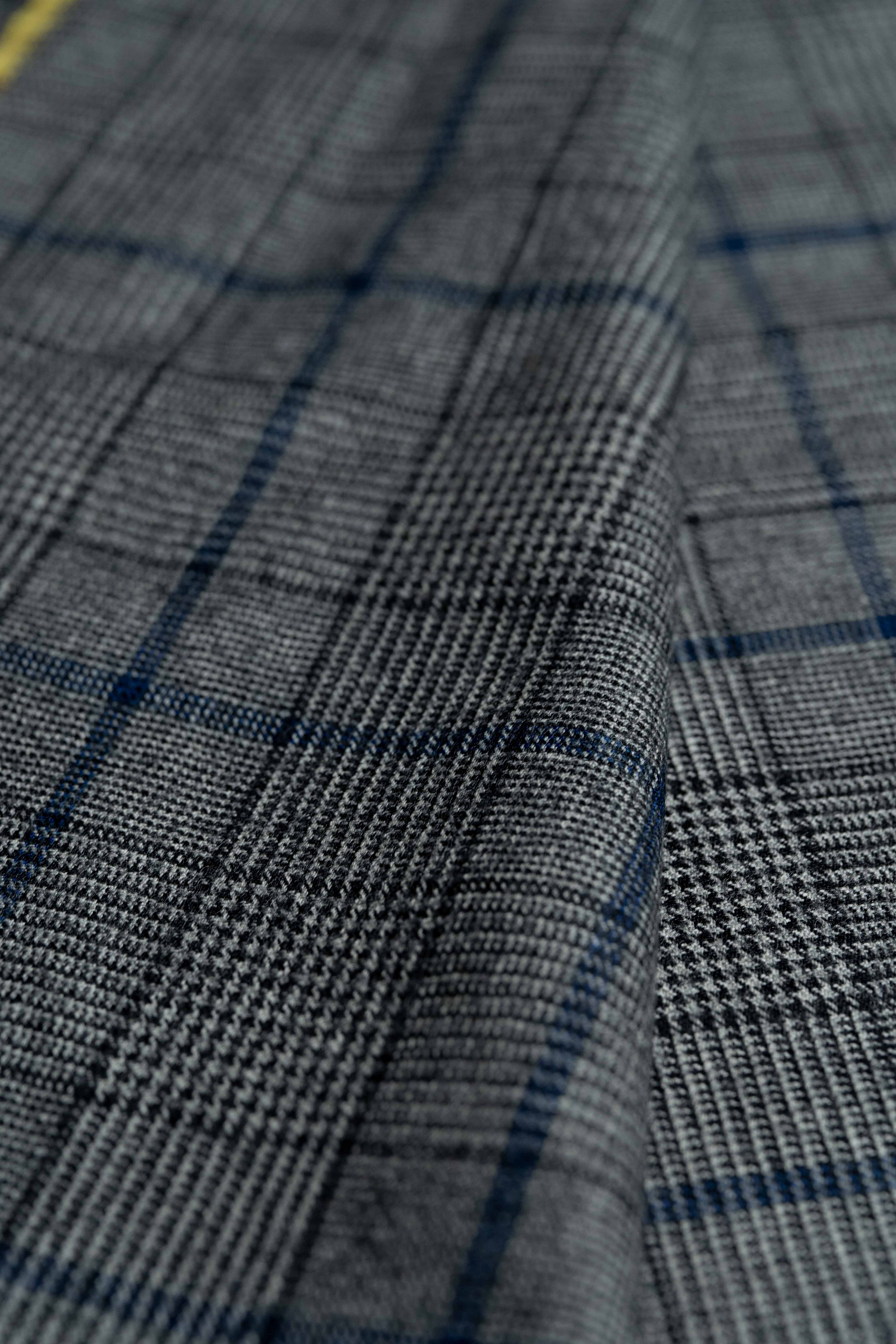 Fratelli Tallia Di Delfino blue Glen Plaid 130's flannel fabric close-up showing intricate patterns.