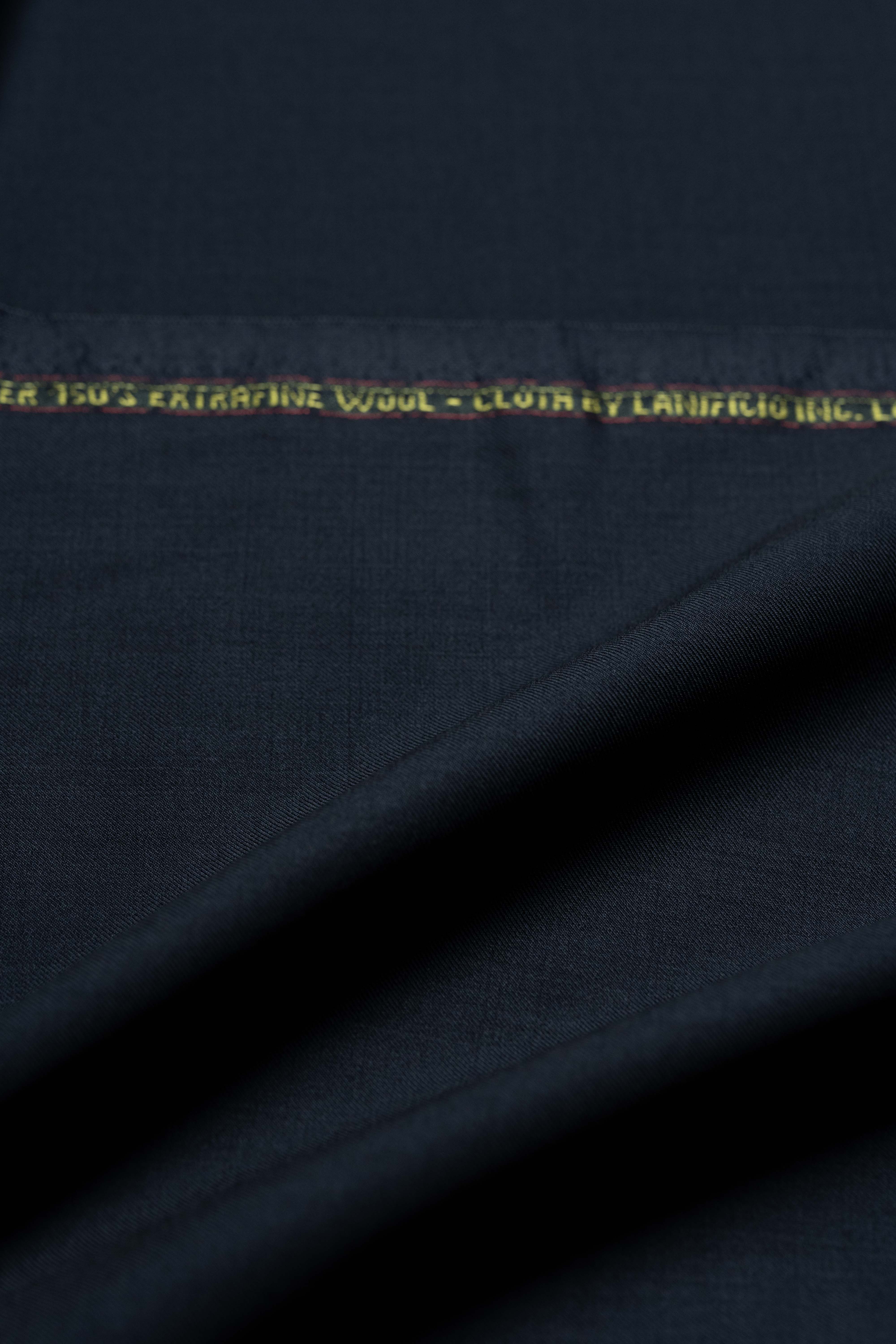 Loro Piana Dark Navy Tasmanian 150's Wool suit fabric detail showing luxurious texture and quality.