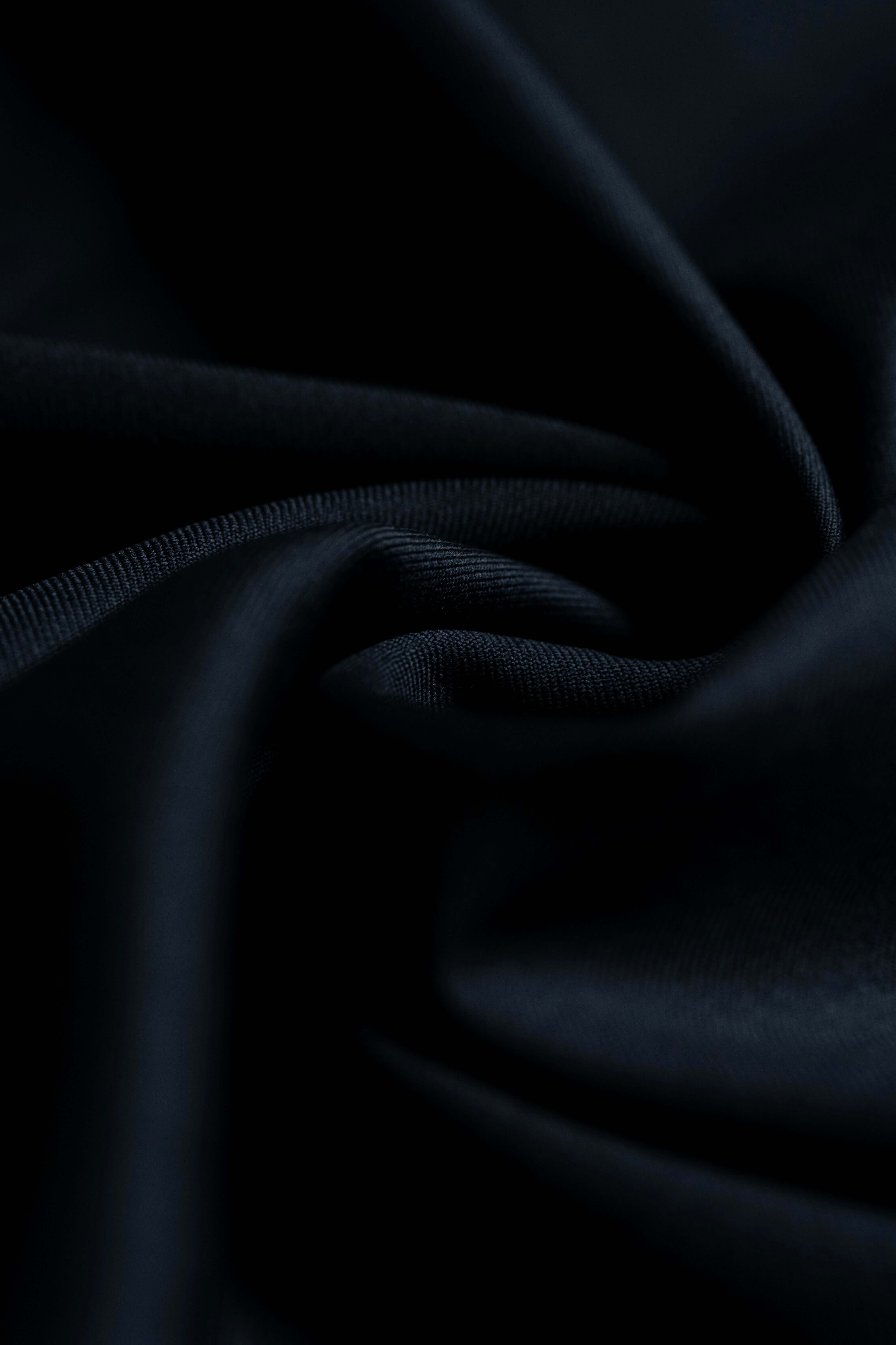 Loro Piana Dark Navy Tasmanian 150's Wool fabric detail showing soft texture and luxurious quality.