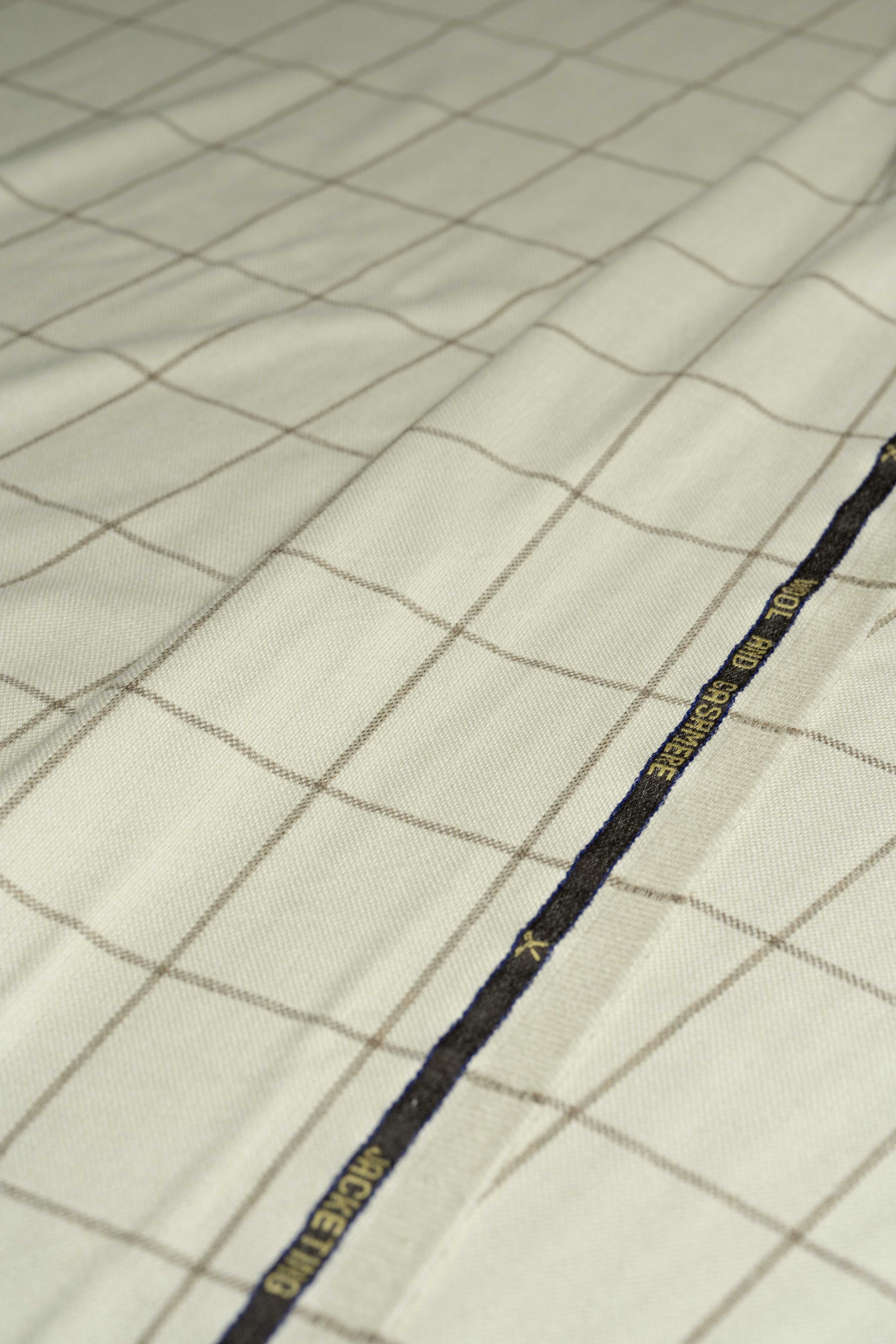 VBC Beige Check Wool & Cashmere Jacketing fabric showcasing a timeless beige check pattern and luxurious texture.