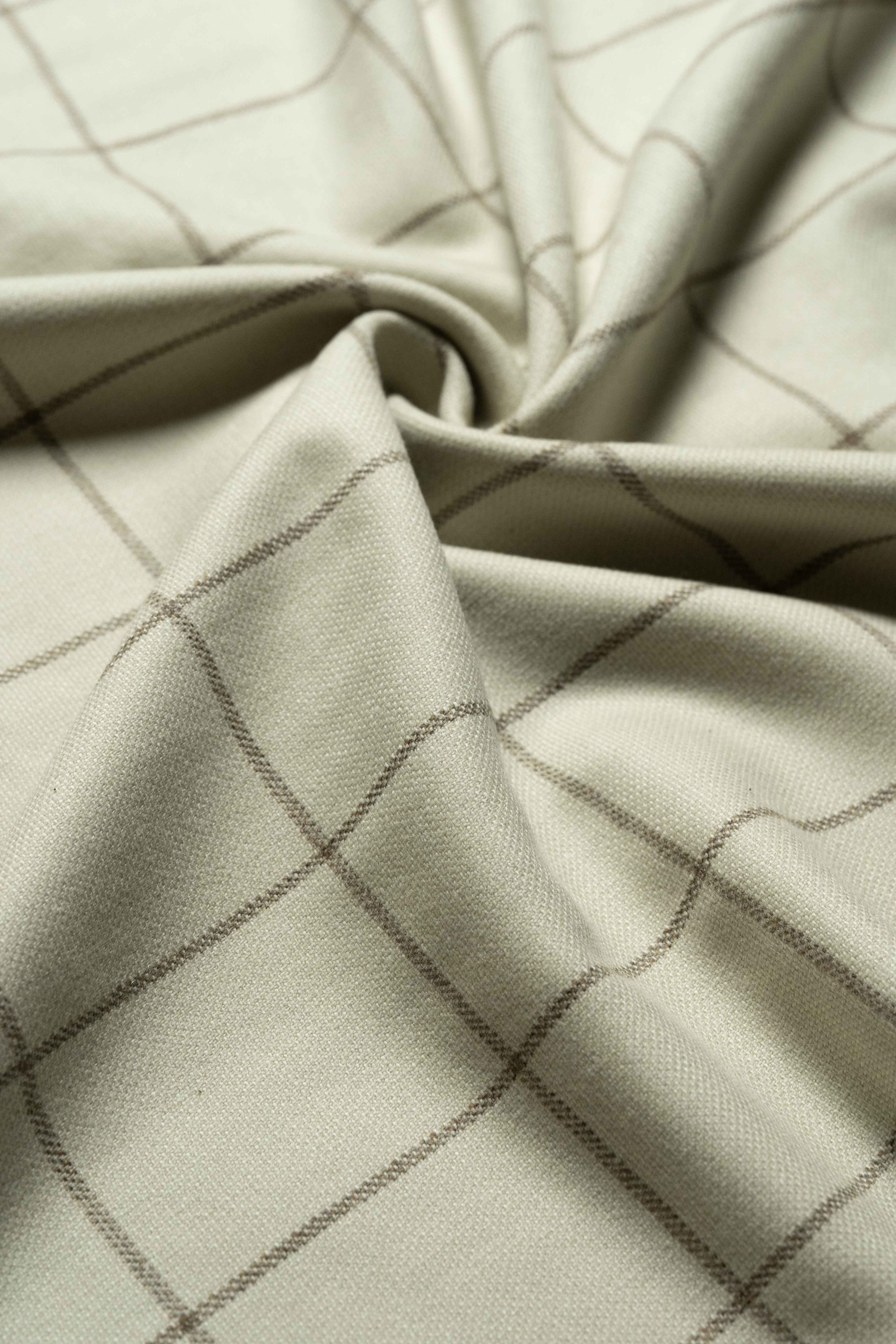 VBC Beige Check Wool & Cashmere Jacketing fabric showcasing a luxurious beige color with a classic check pattern.