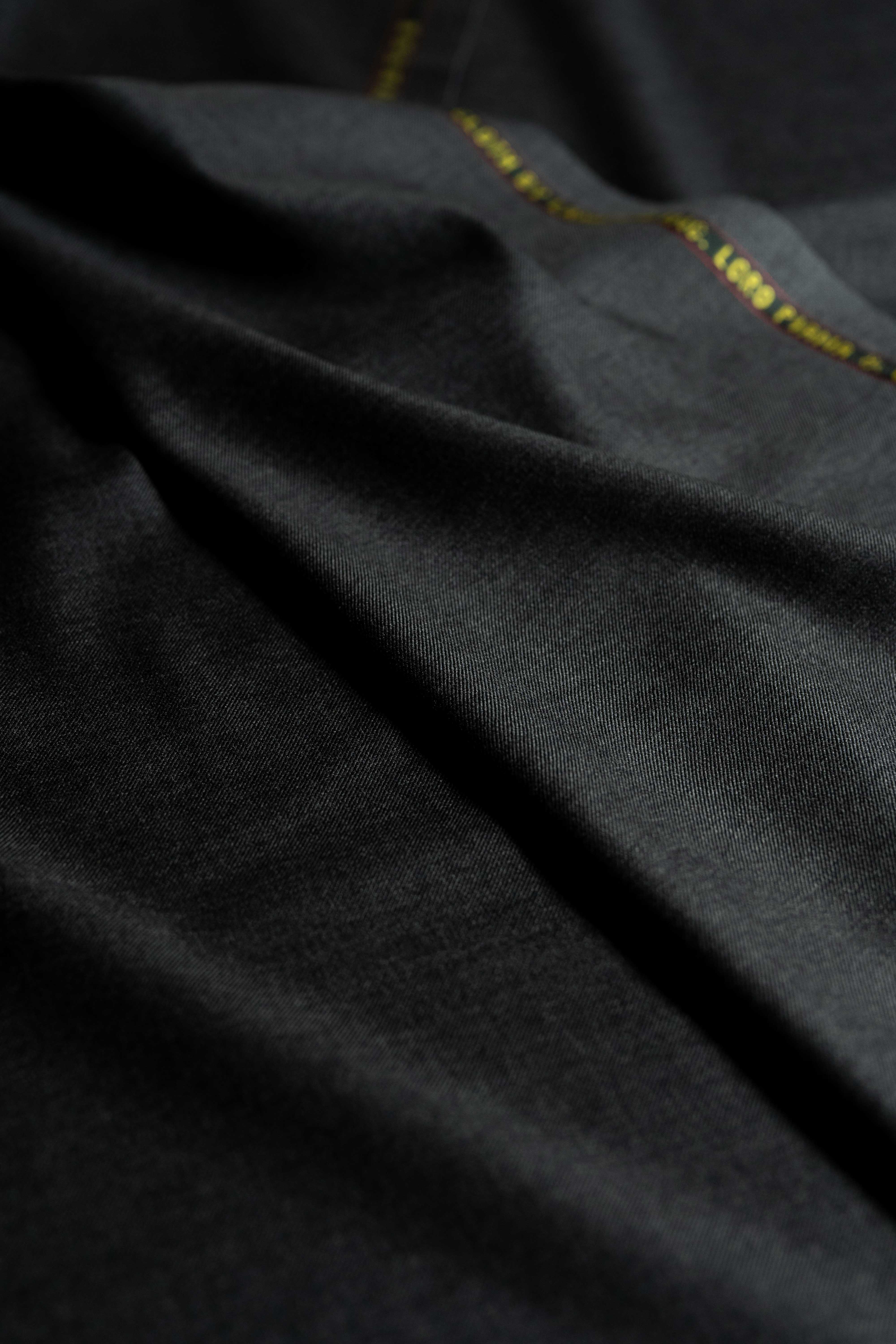 Loro Piana Charcoal 130's Merino Wool Suit Fabric with soft texture and refined look.