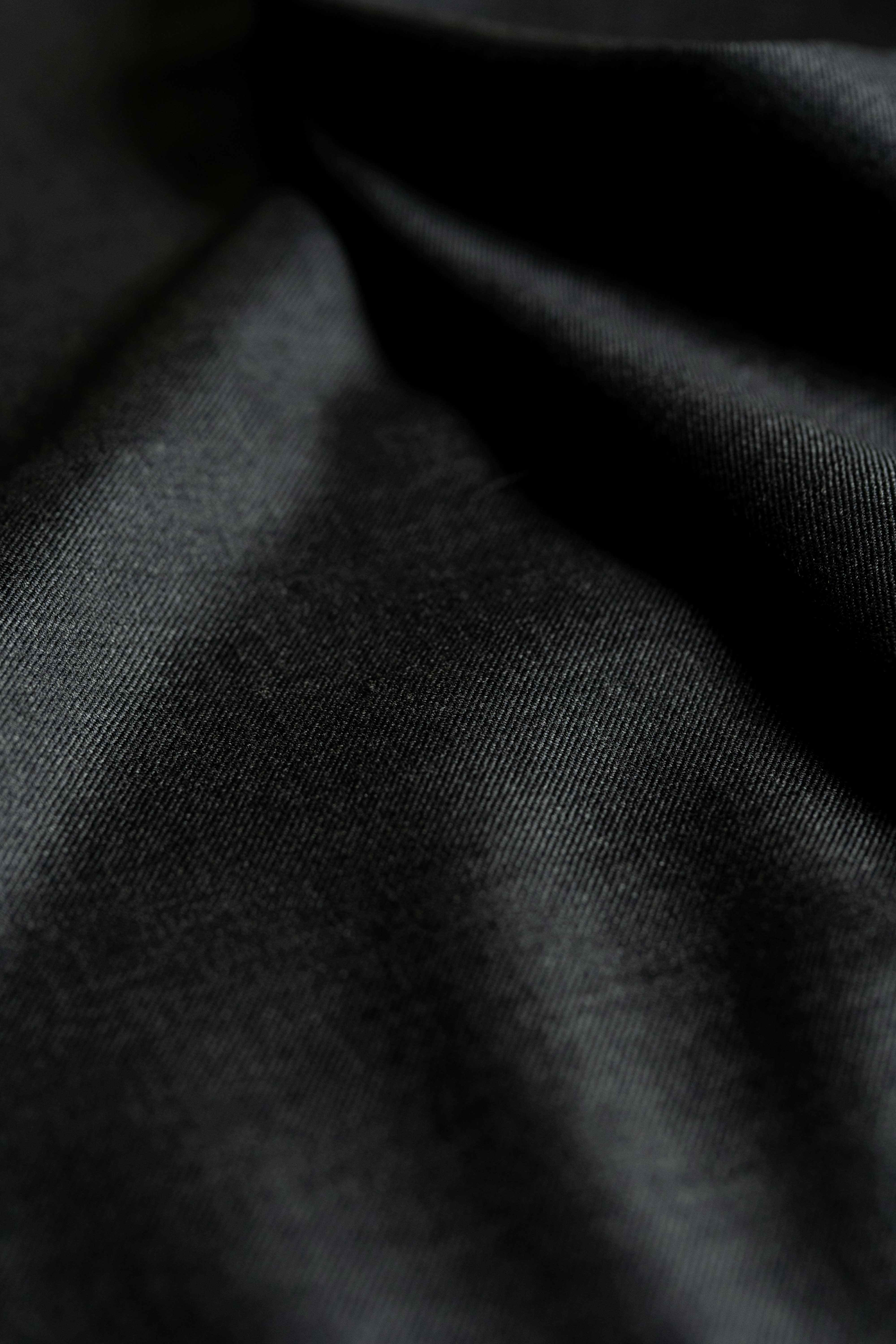 Loro Piana Charcoal 130's Merino Wool Suit Fabric, close-up view of luxurious texture and refined color.
