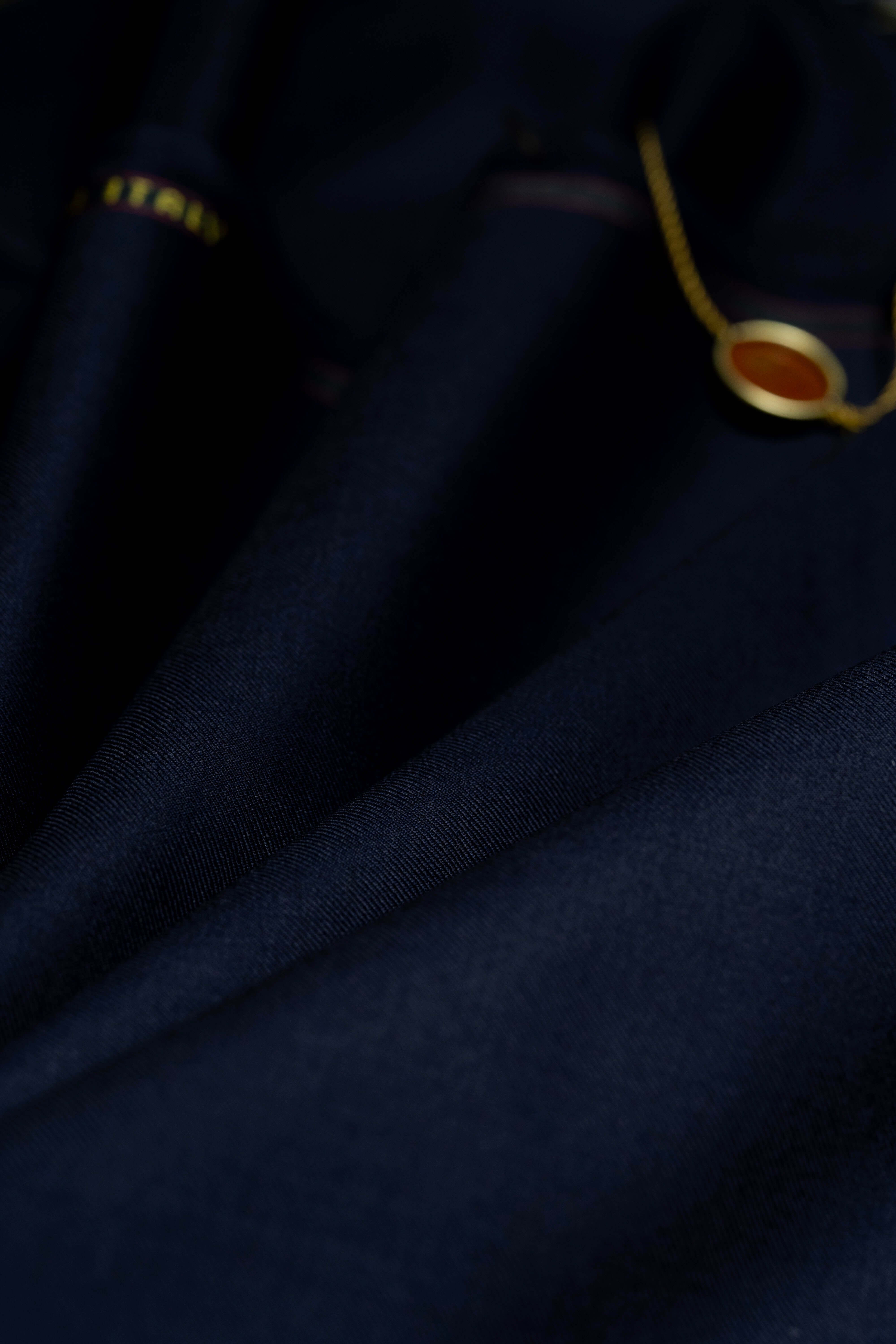 Loro Piana Dark Navy 150's Merino Wool Suit Fabric showcasing luxurious texture and color.