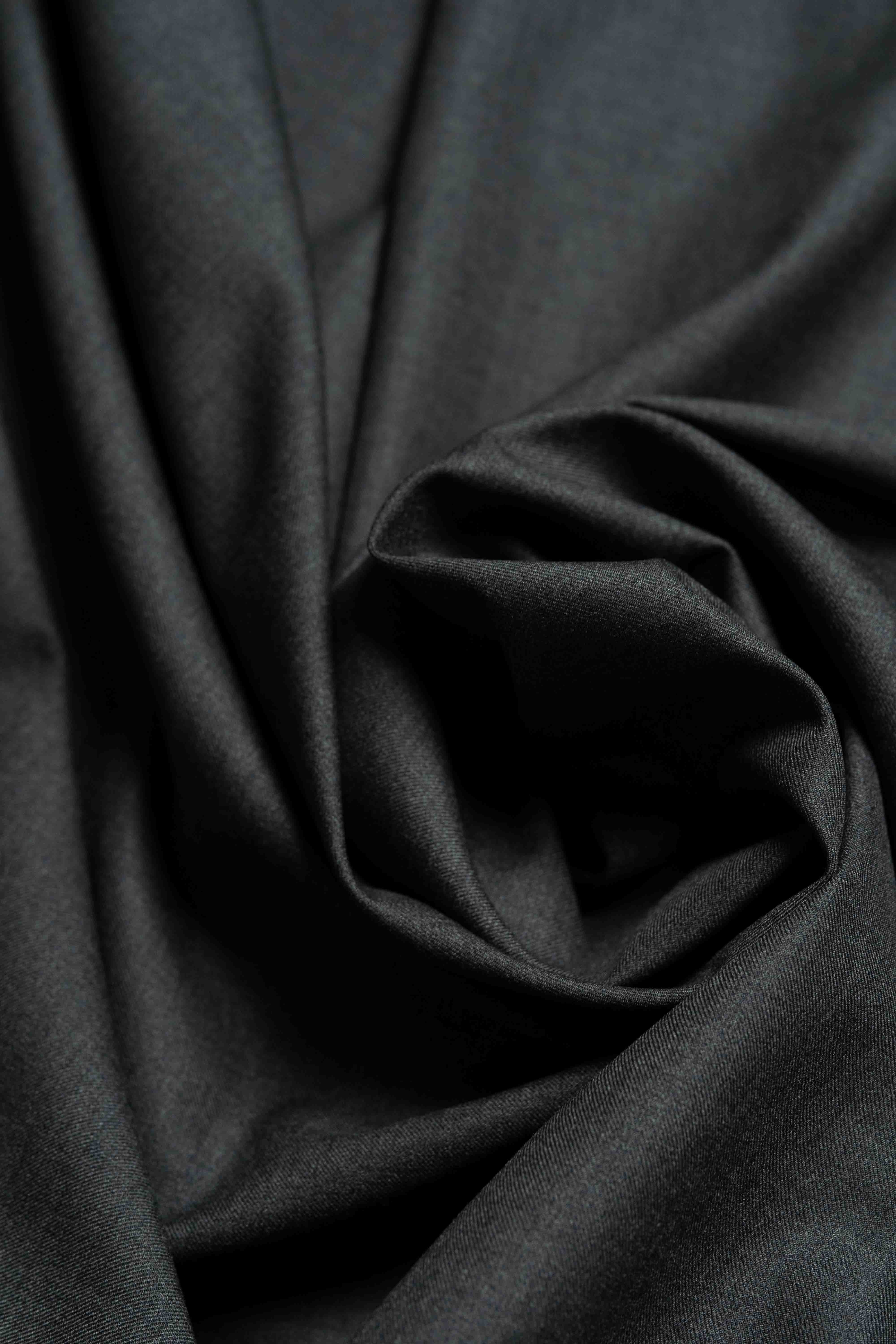 VBC Dark Grey Super 140's Wool Suit Fabric showing detailed texture and draping in luxury wool material.
