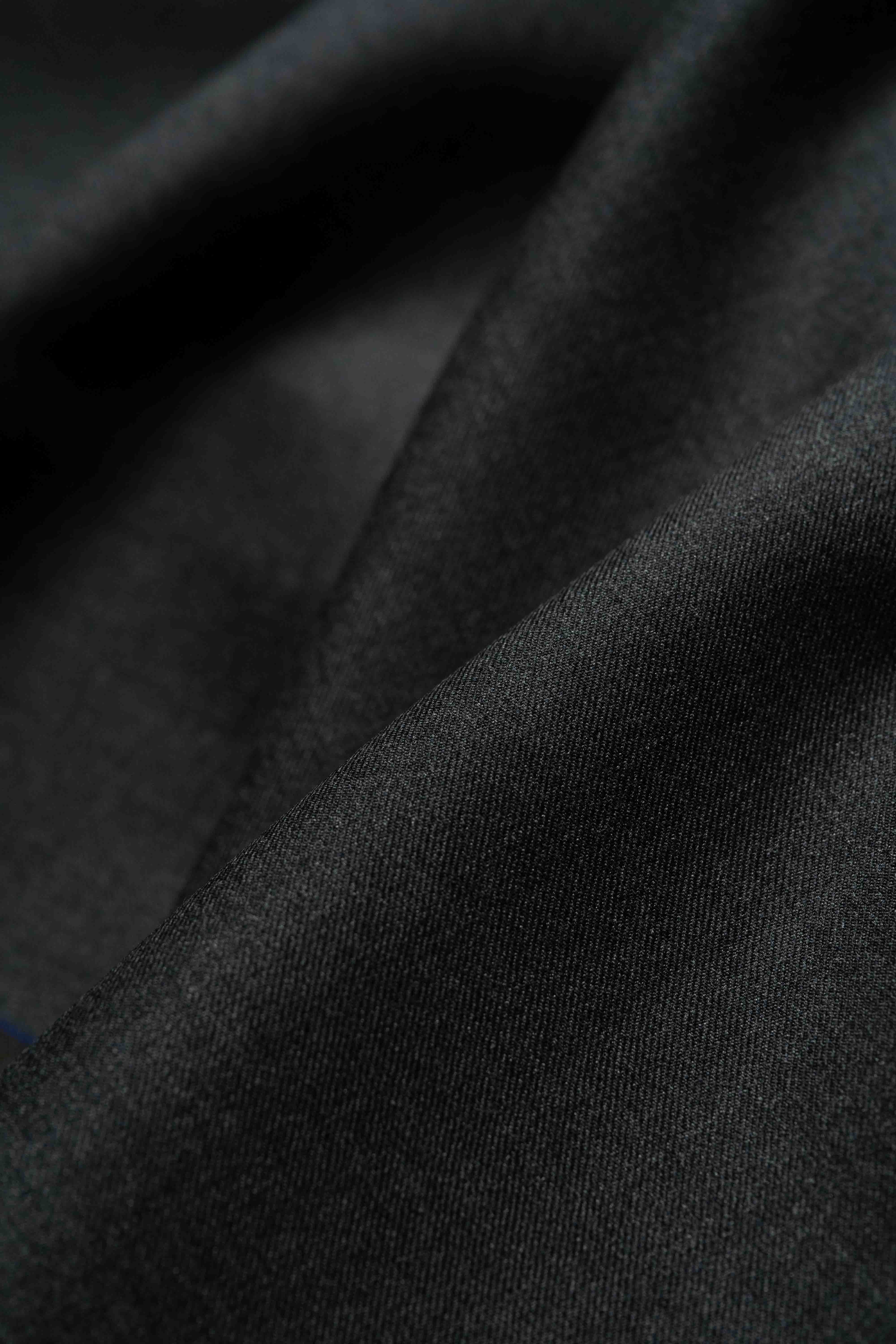 VBC Dark Grey Super 140's Wool Suit Fabric showcasing a smooth and elegant texture.