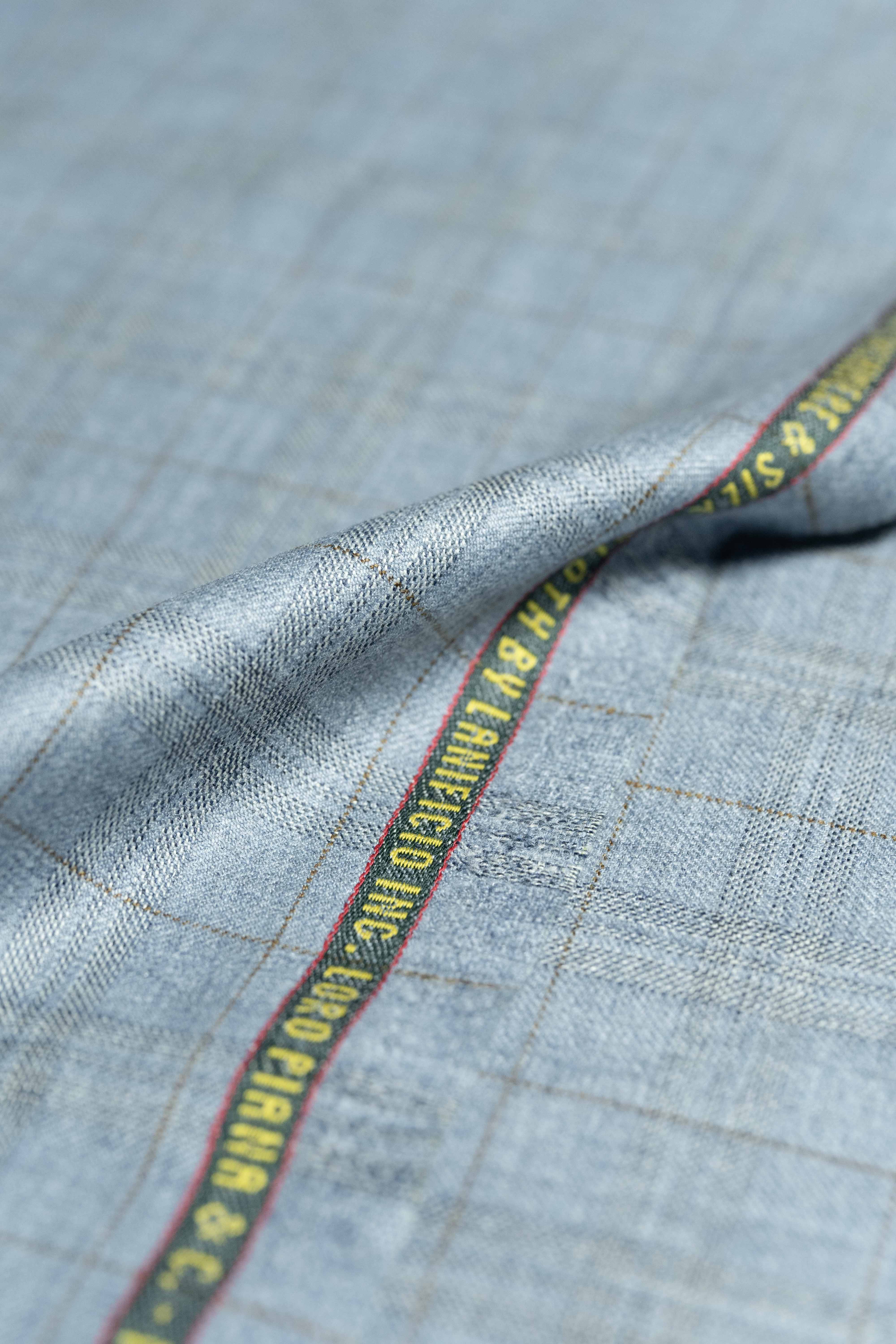 Loro Piana Light Blue Cashmere Silk Jacket Fabric showcasing luxurious texture and quality craftsmanship.
