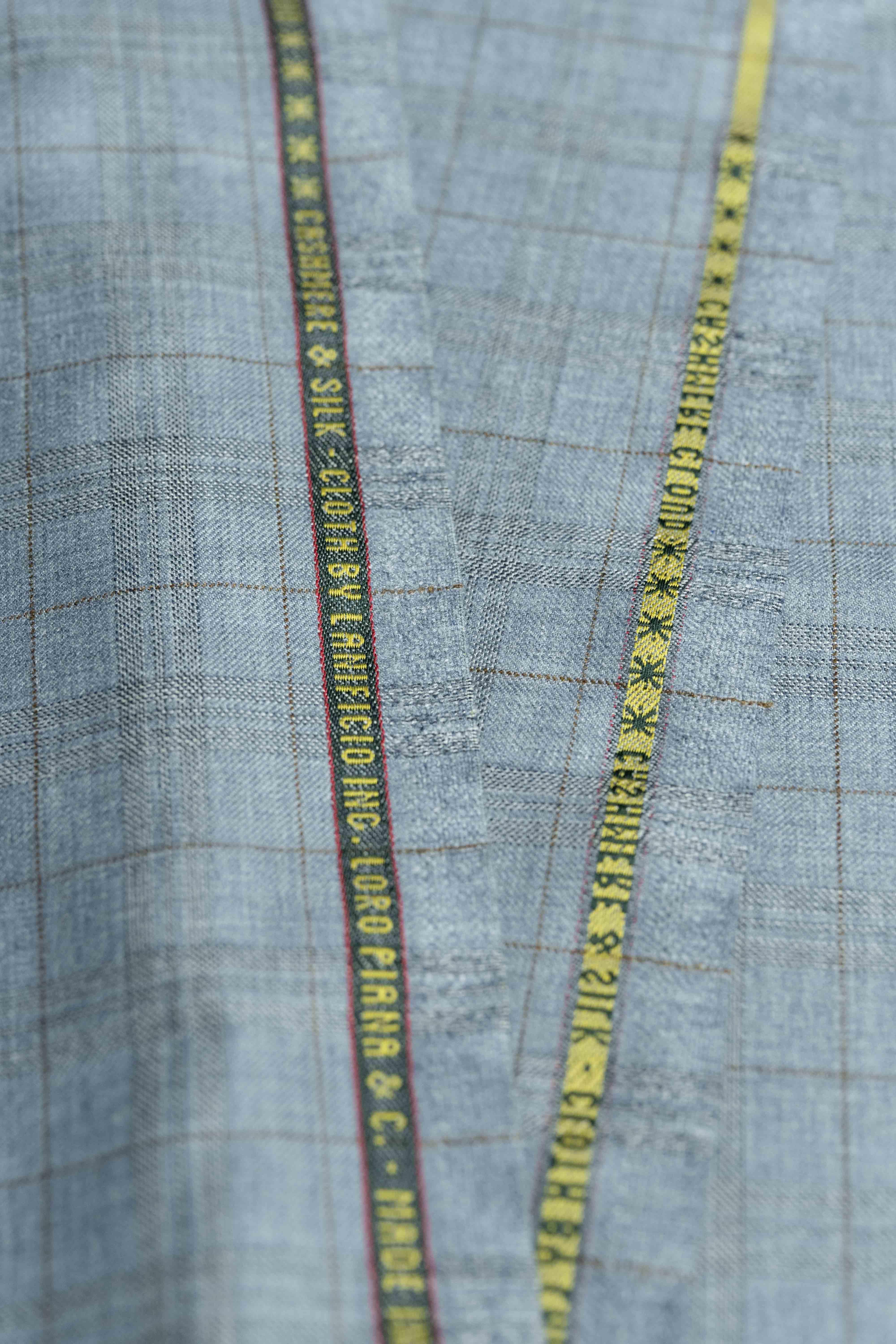 Loro Piana light blue cashmere silk jacket fabric featuring a rich texture and luxurious design.