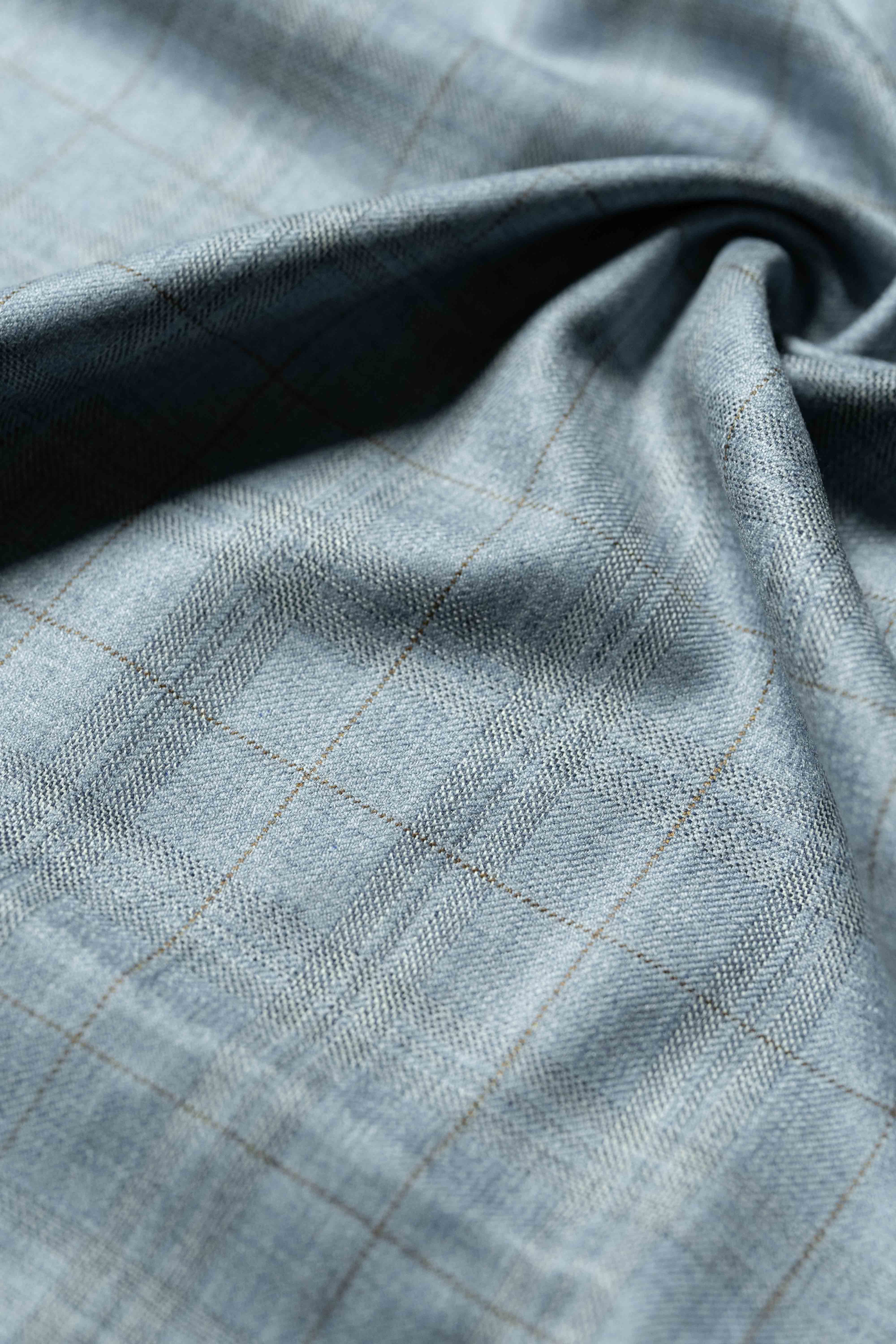 Loro Piana Light Blue Cashmere Silk Jacket Fabric showcasing intricate texture and premium quality.