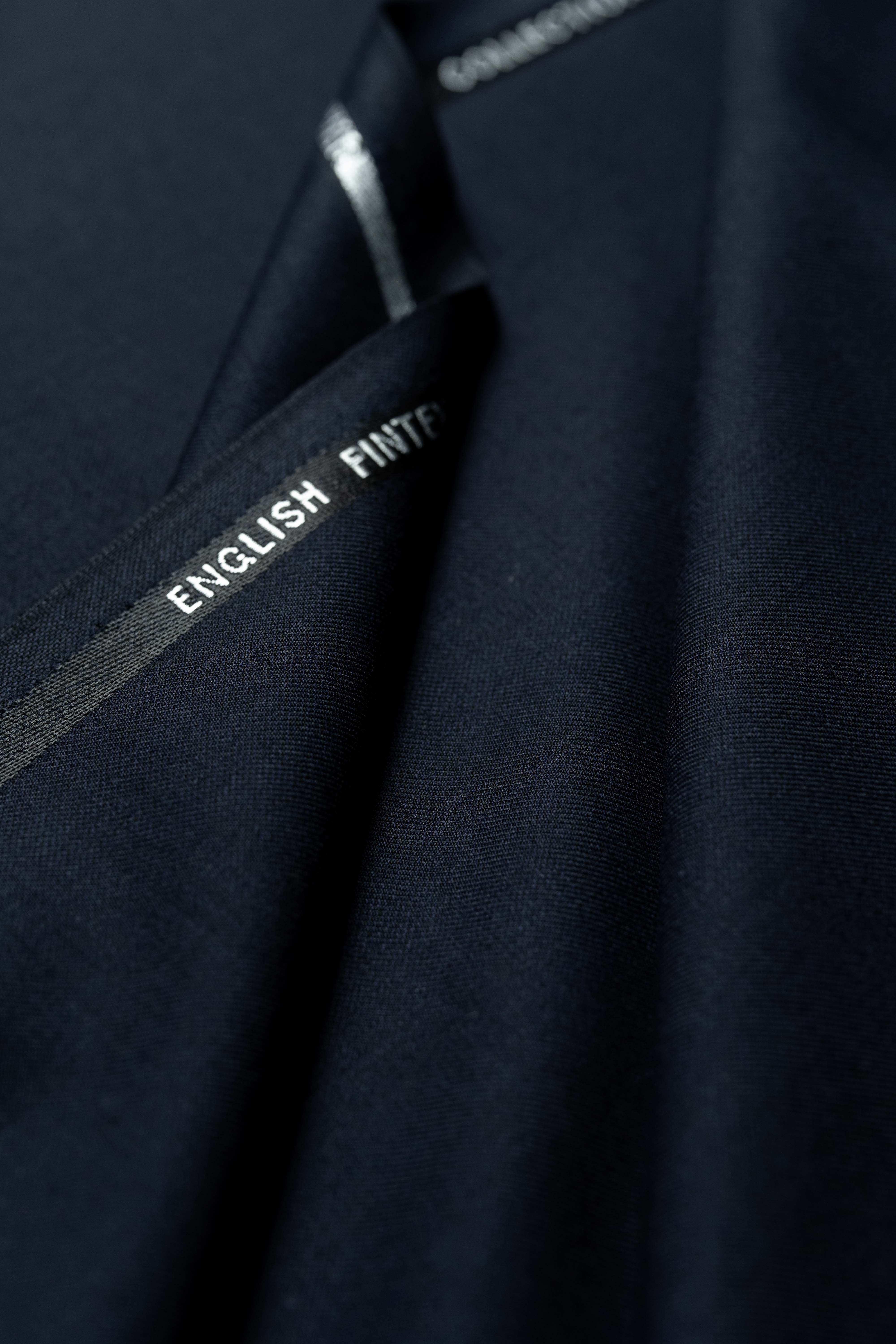 Fintex of London Midnight Navy wool suit fabric with English label detail