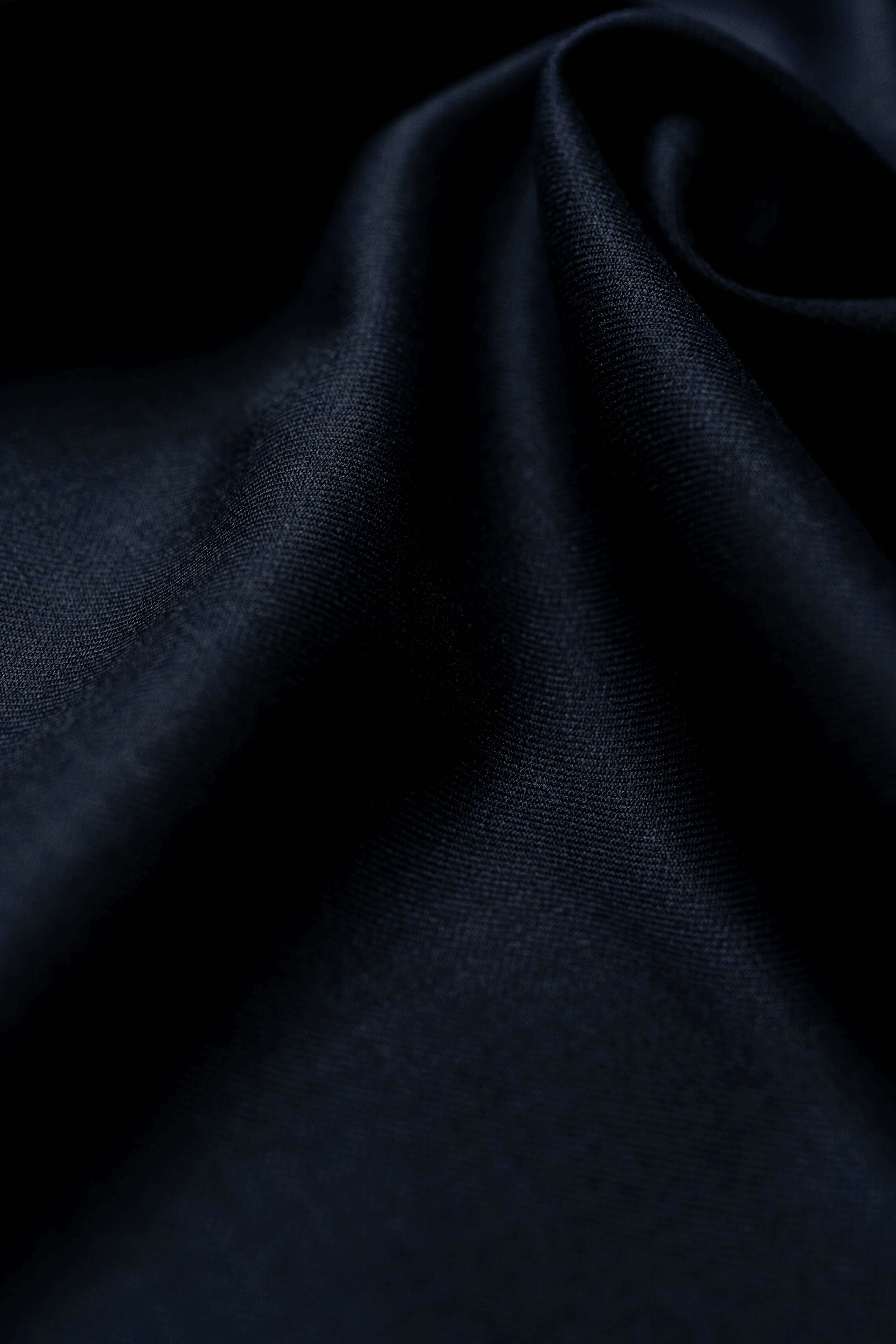 Fintex of London Midnight Navy Wool Suit Fabric showing luxurious texture and quality craftsmanship.