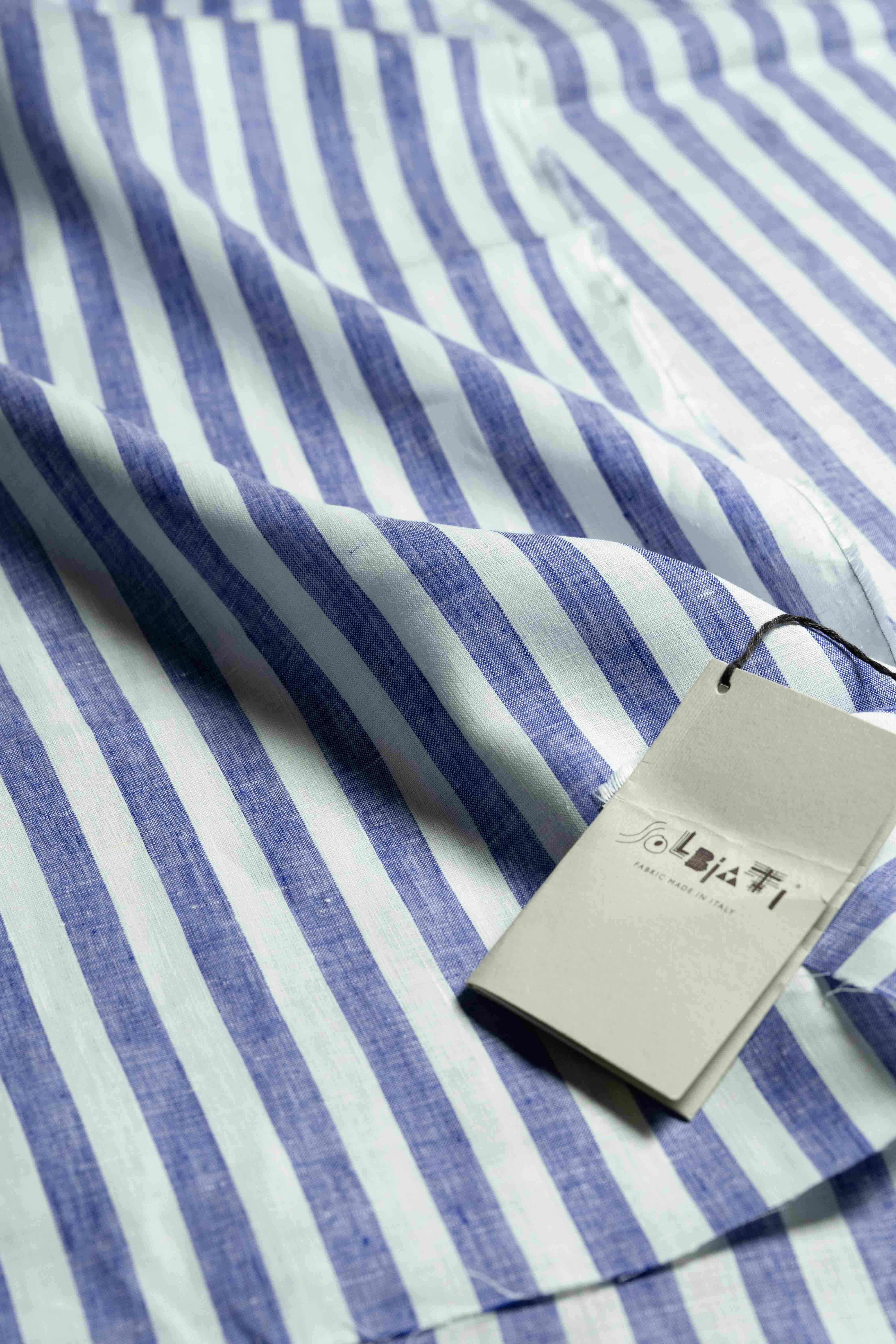 Solbiati linen navy stripe shirt fabric showcasing premium quality and Italian craftsmanship.