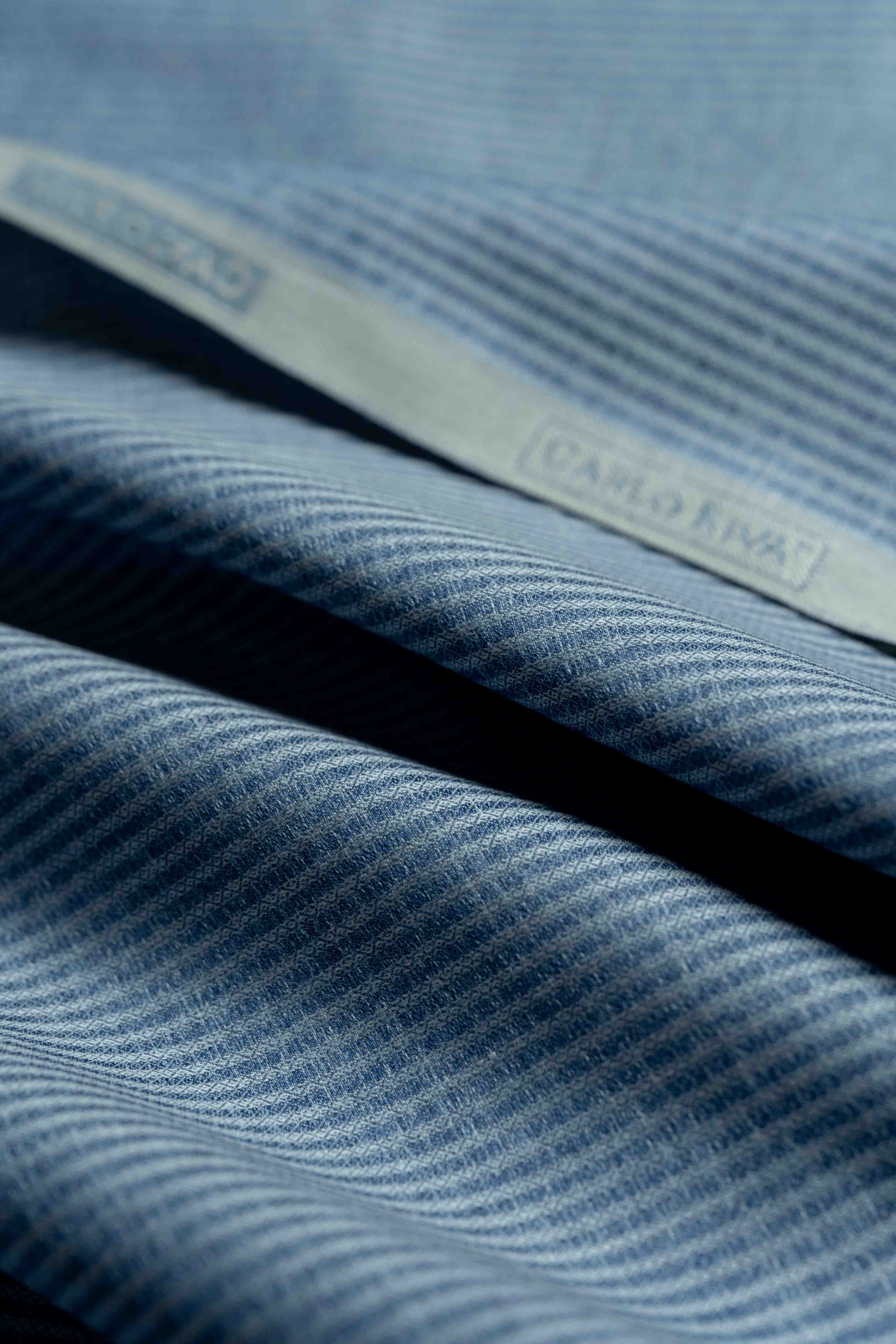 Carlo Riva blue stripe shirt fabric with a width of 90cm, showcasing its intricate texture and design.