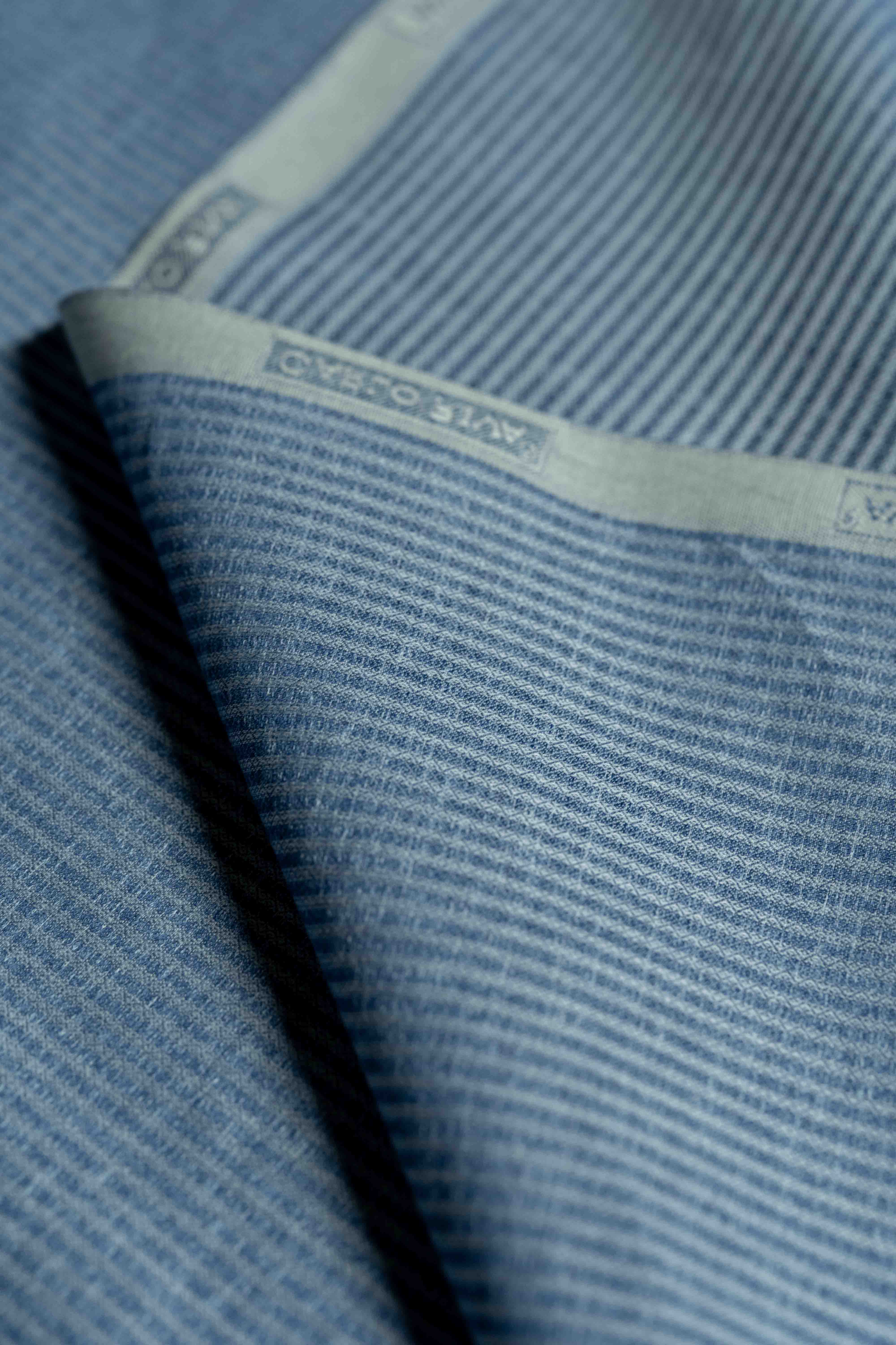 Carlo Riva Blue Stripe Shirt Fabric with a 90cm width, showcasing elegant blue stripes and soft texture.