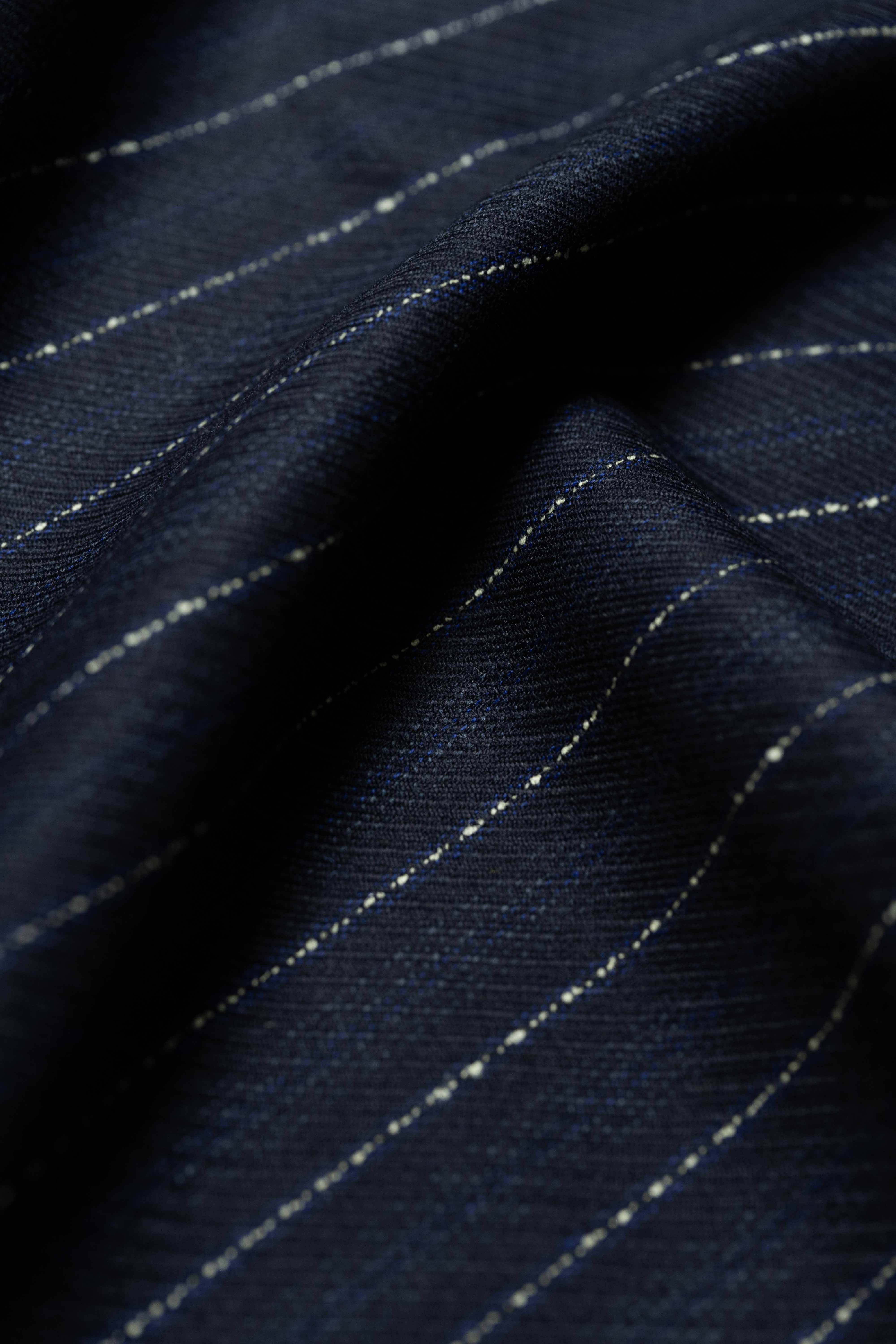 Dormeuil Blue & White Stripe Wool Suiting fabric close-up showcasing fine stripes and texture.