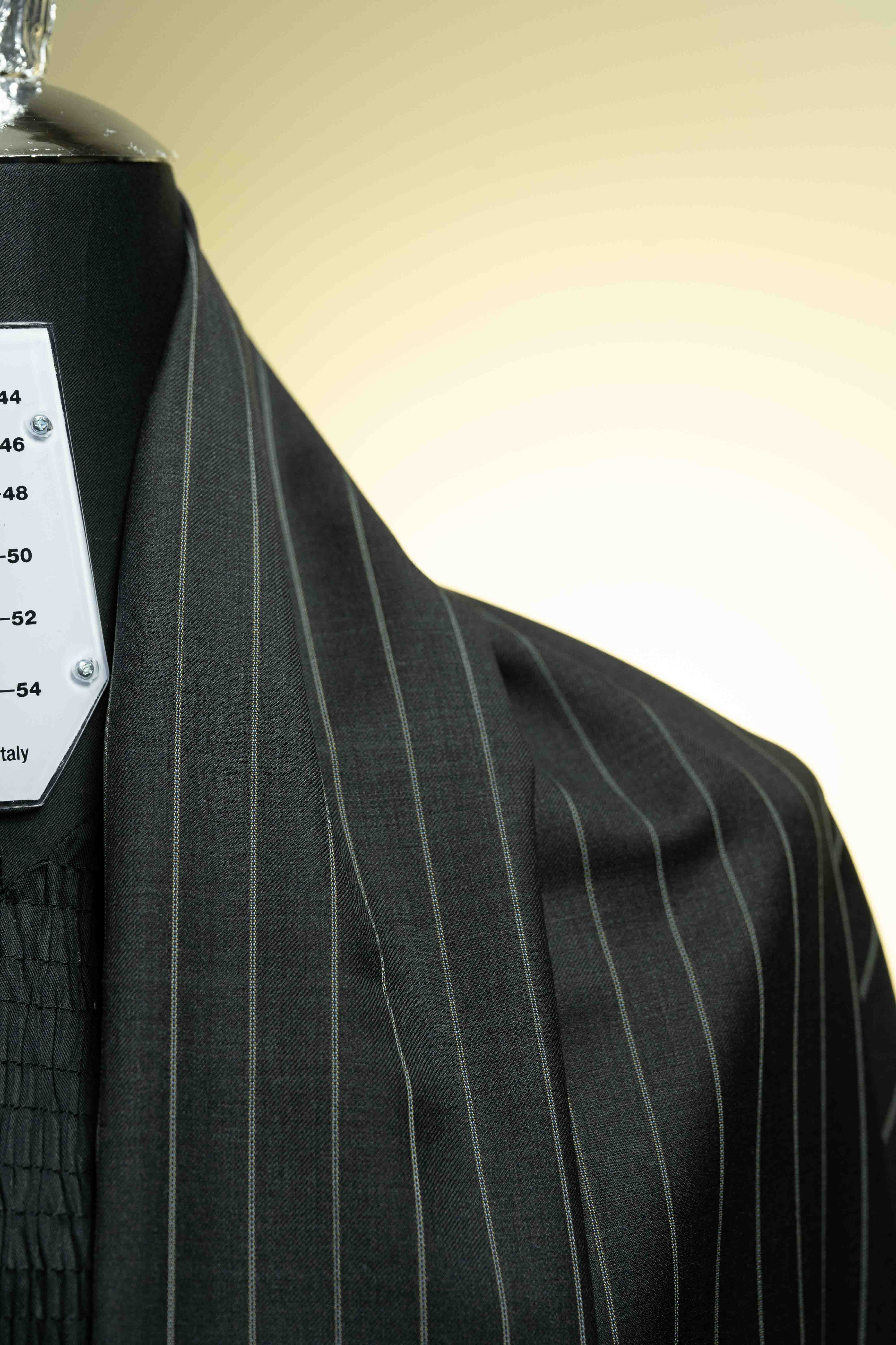 Charcoal stripe 150's & Cashmere suiting close-up, showcasing luxurious cashmere texture.