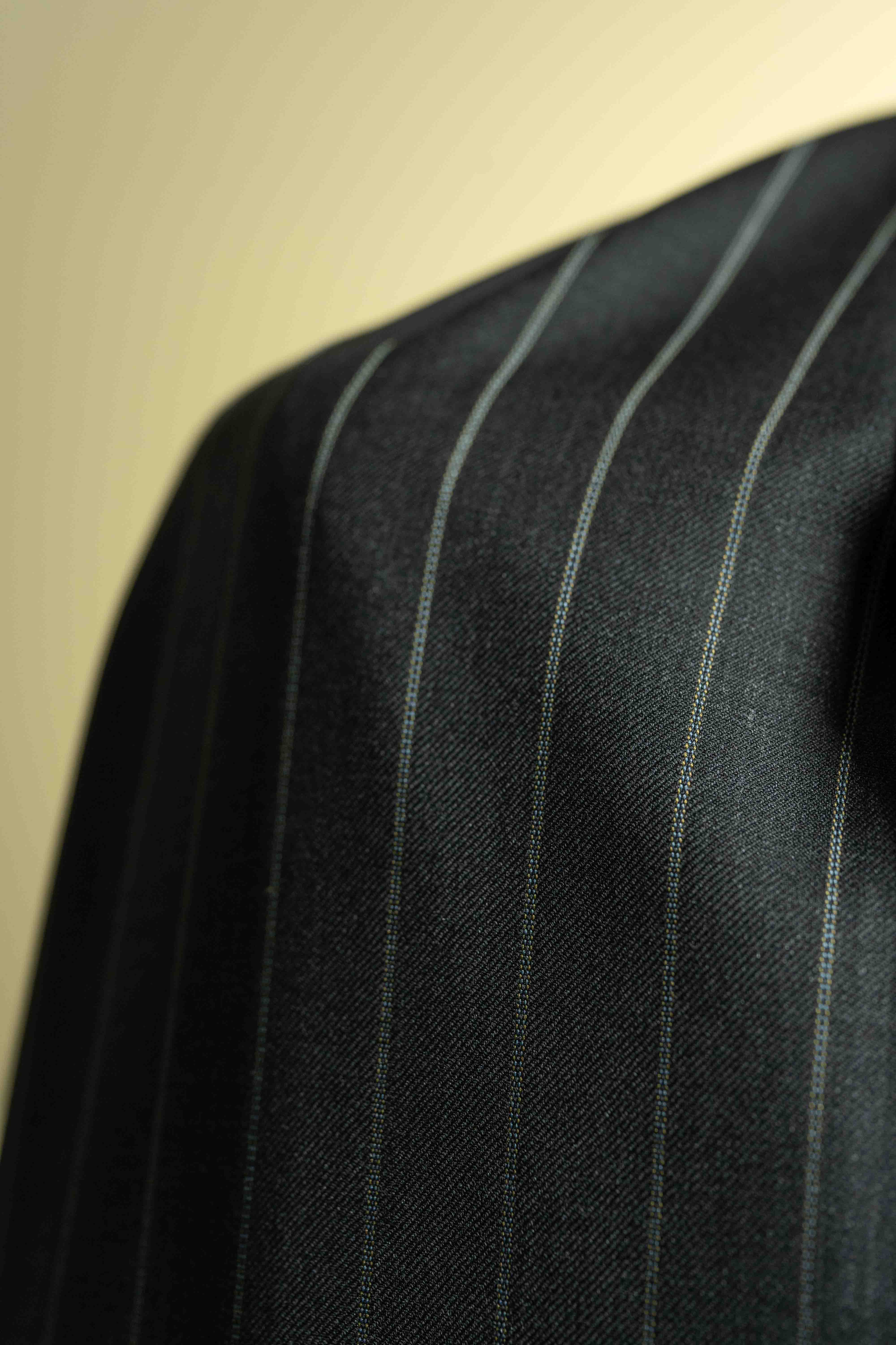 Charcoal Stripe 150's & Cashmere Suiting fabric close-up featuring luxurious Cashmere material.
