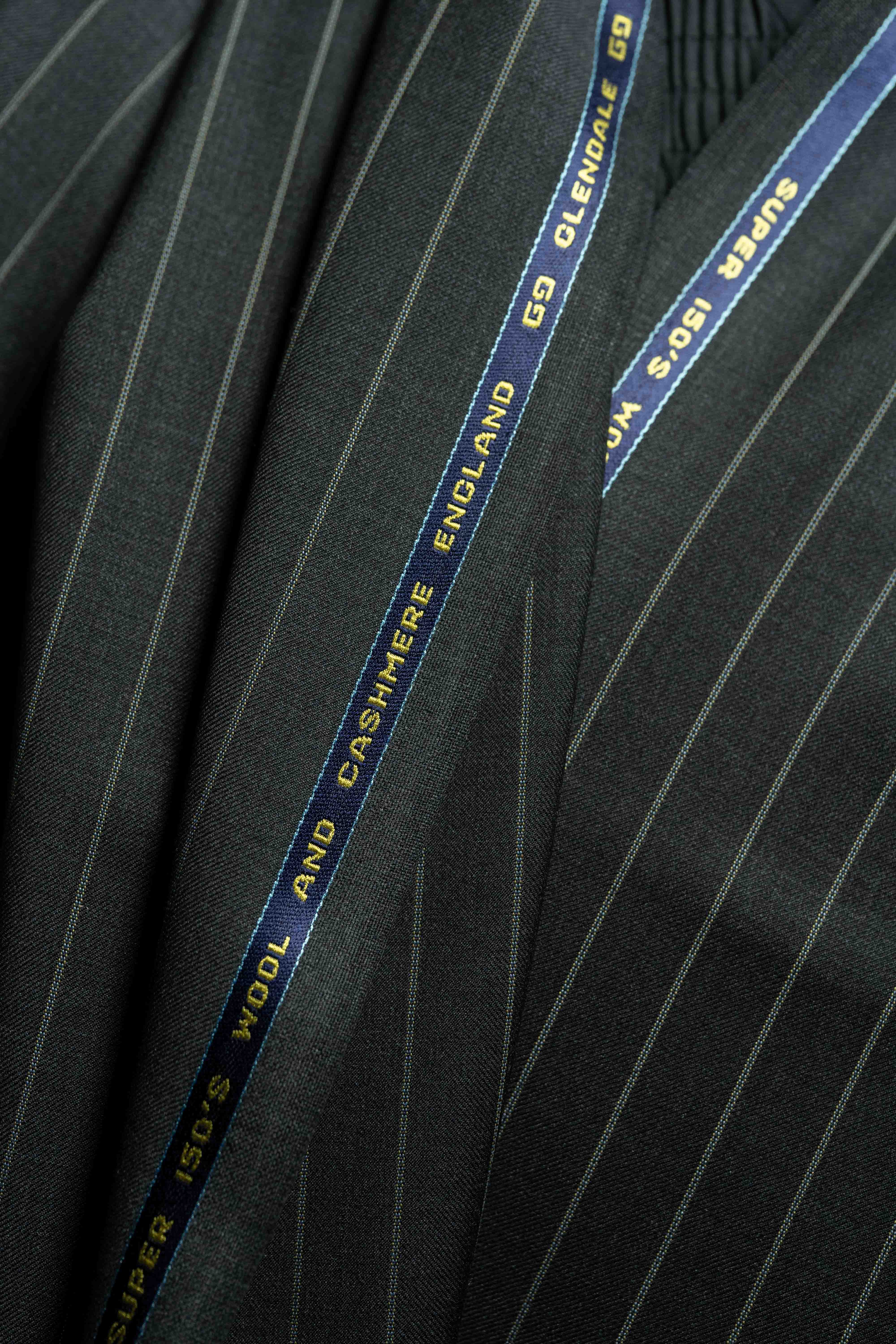 Close-up of Charcoal Stripe 150's & Cashmere Suiting fabric, highlighting luxurious Cashmere texture.